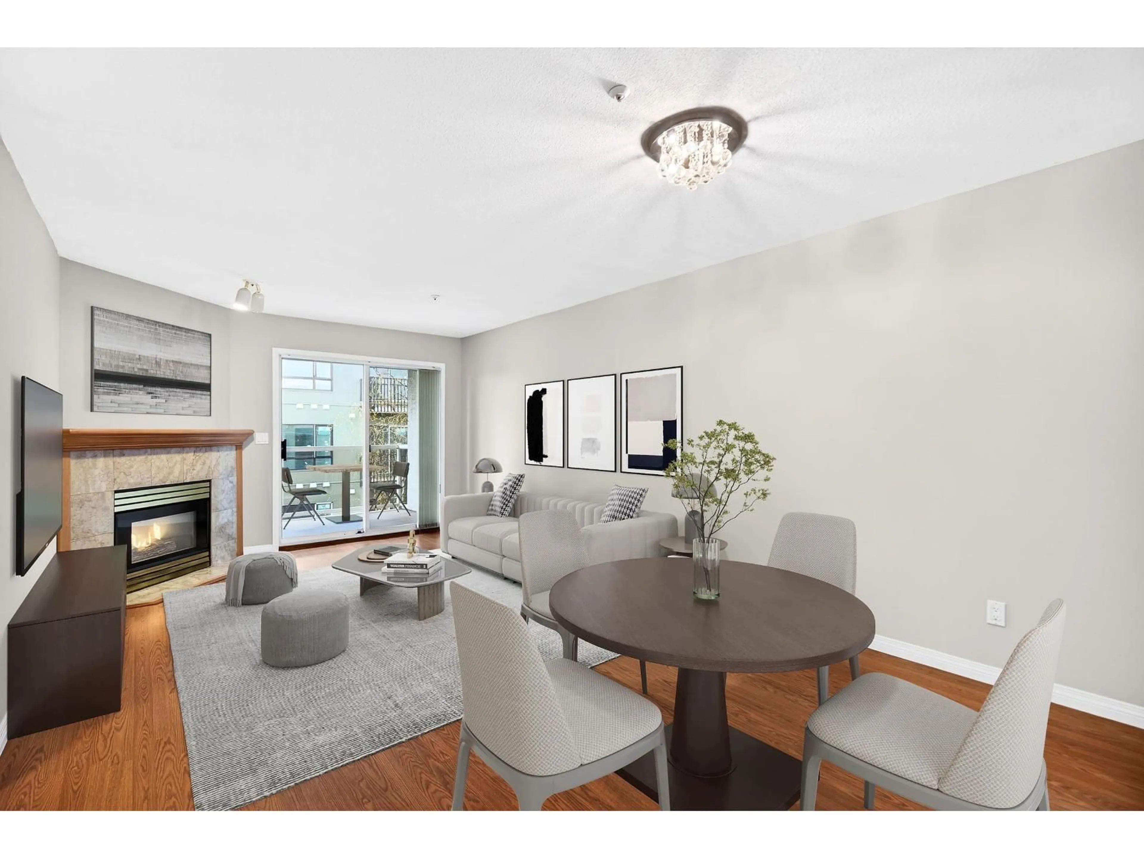 Living room with furniture, wood/laminate floor for 303 - 20240 54A AVENUE, Langley British Columbia V3A3W7