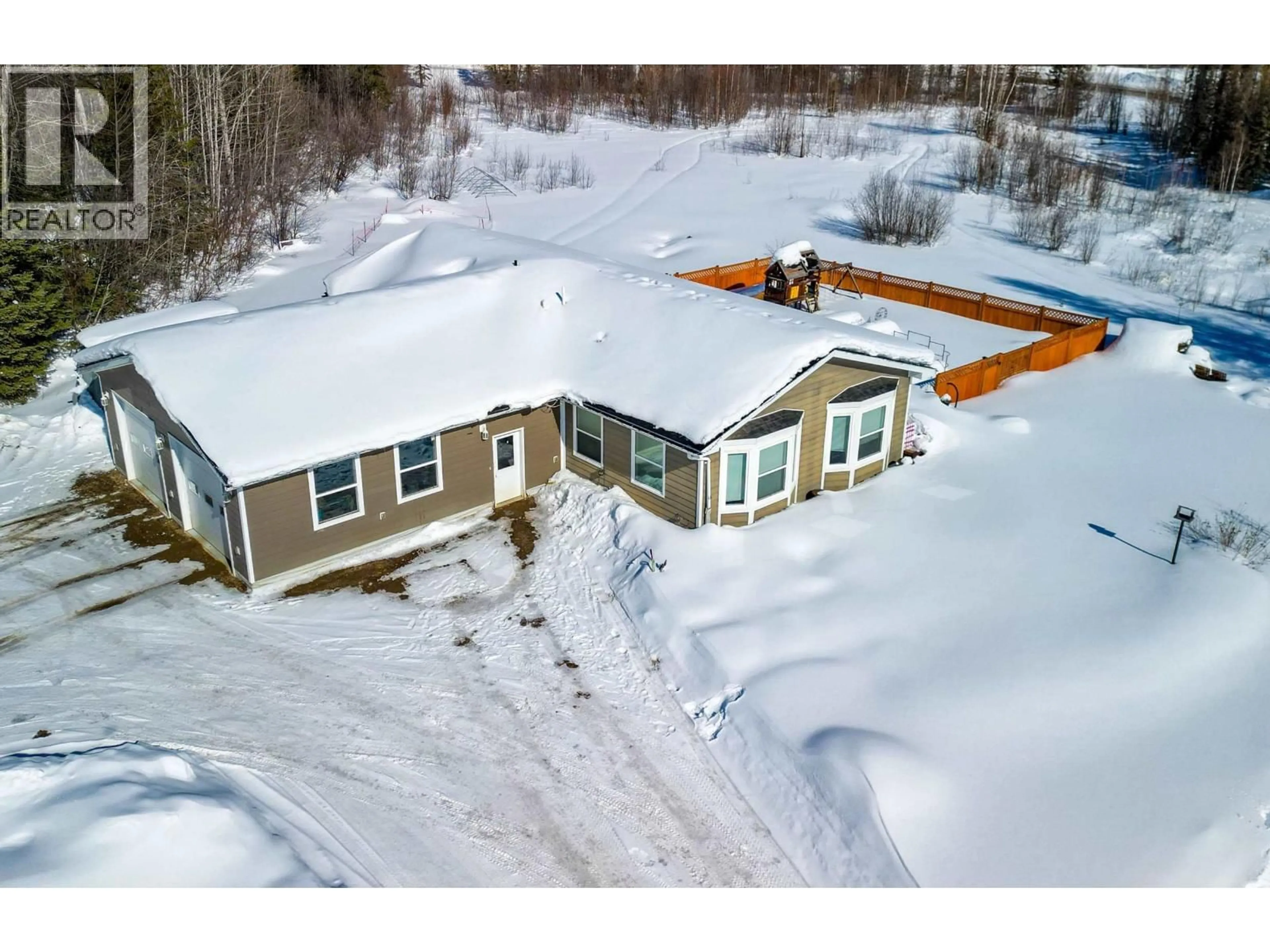 A pic from outside/outdoor area/front of a property/back of a property/a pic from drone, building for 34 PEBBLE DRIVE, Fort Nelson British Columbia V0C1R0