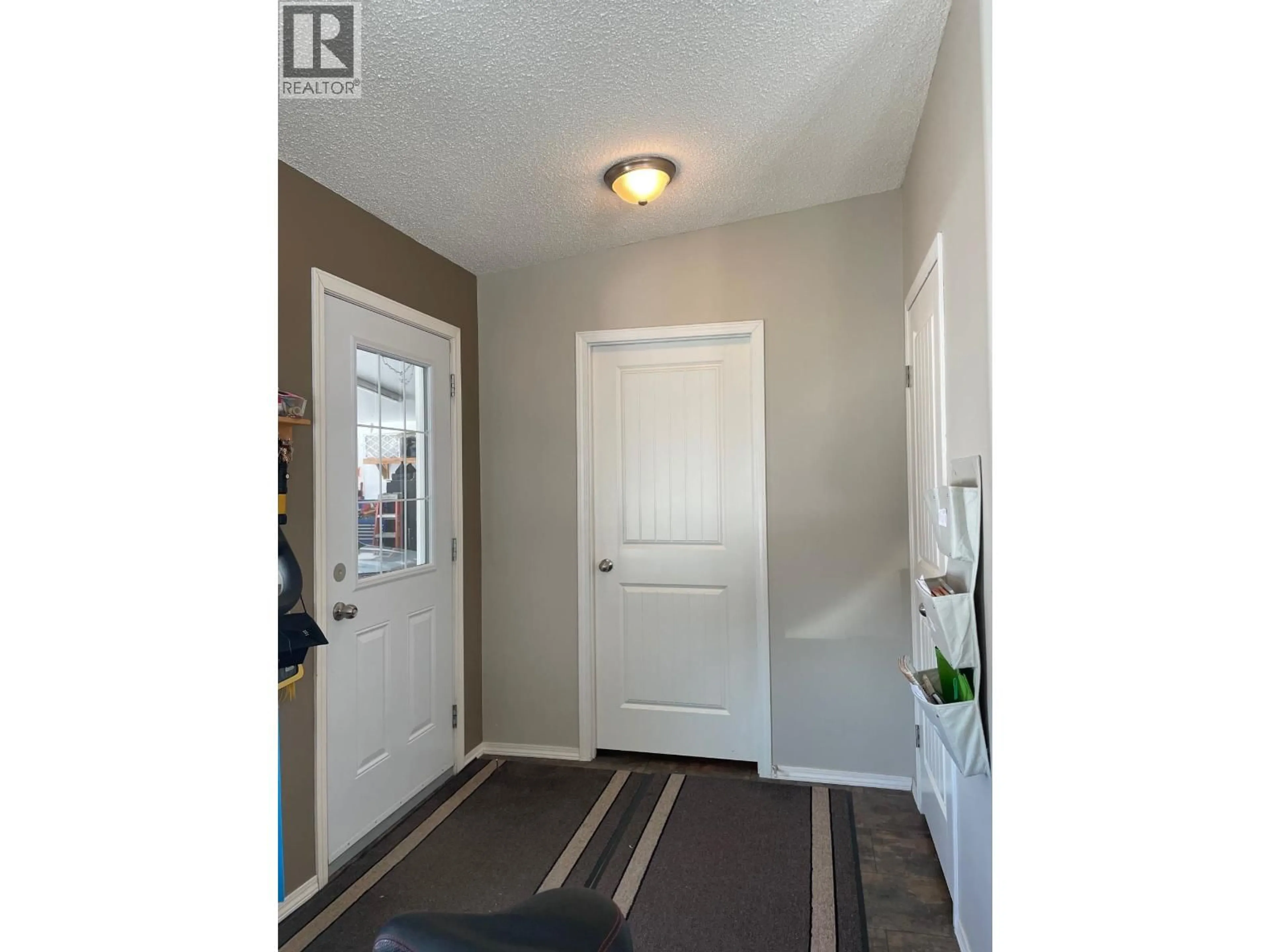 Indoor entryway for 34 PEBBLE DRIVE, Fort Nelson British Columbia V0C1R0