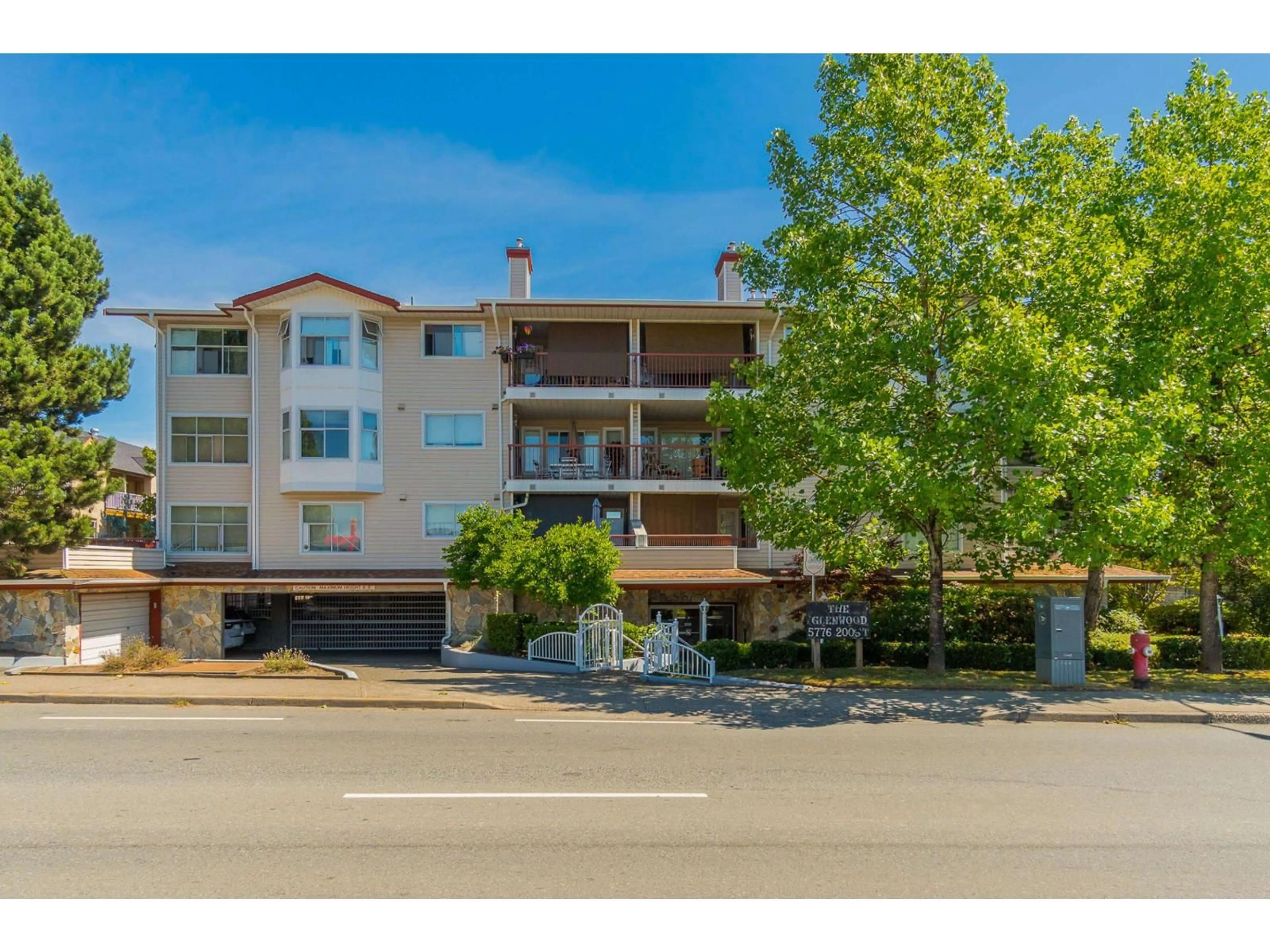 A pic from outside/outdoor area/front of a property/back of a property/a pic from drone, street for 103 - 5776 200 STREET, Langley British Columbia V3A1M8