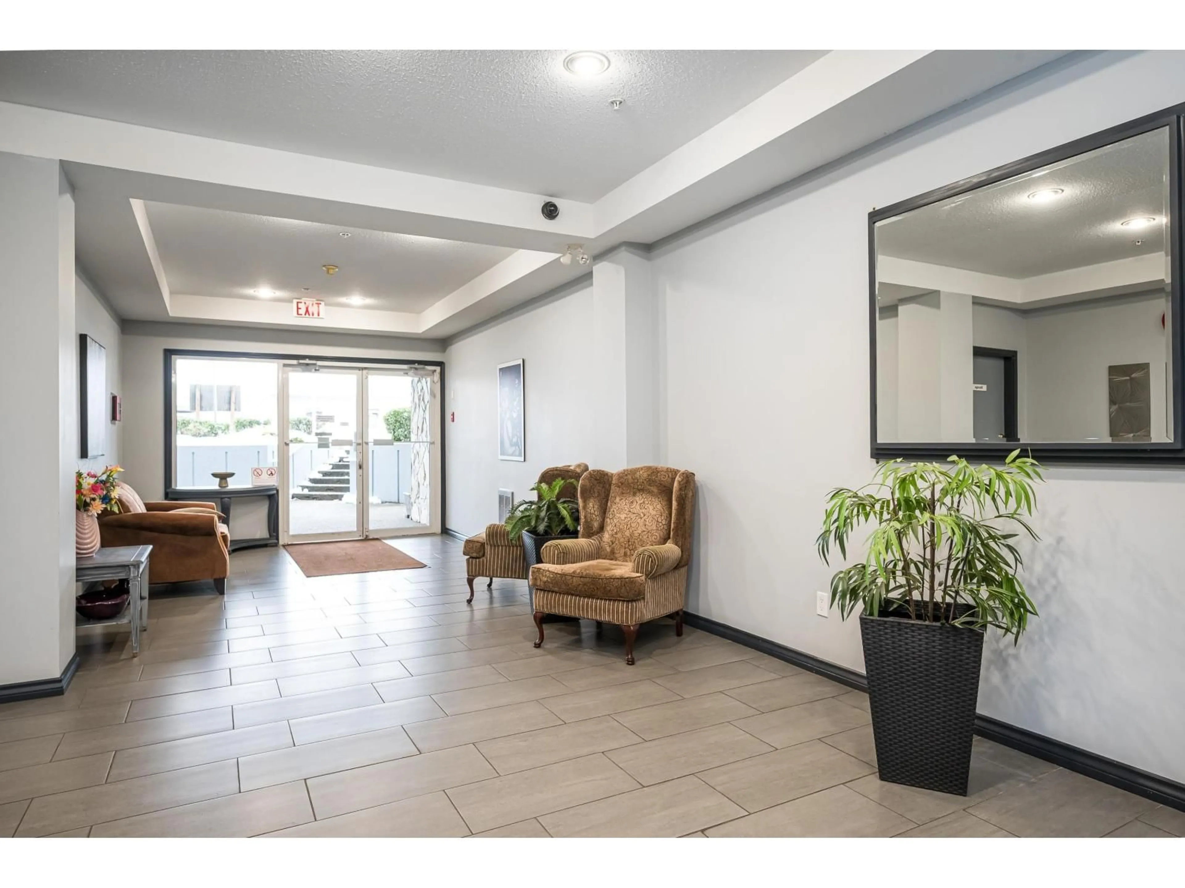 Indoor foyer for 103 - 5776 200 STREET, Langley British Columbia V3A1M8