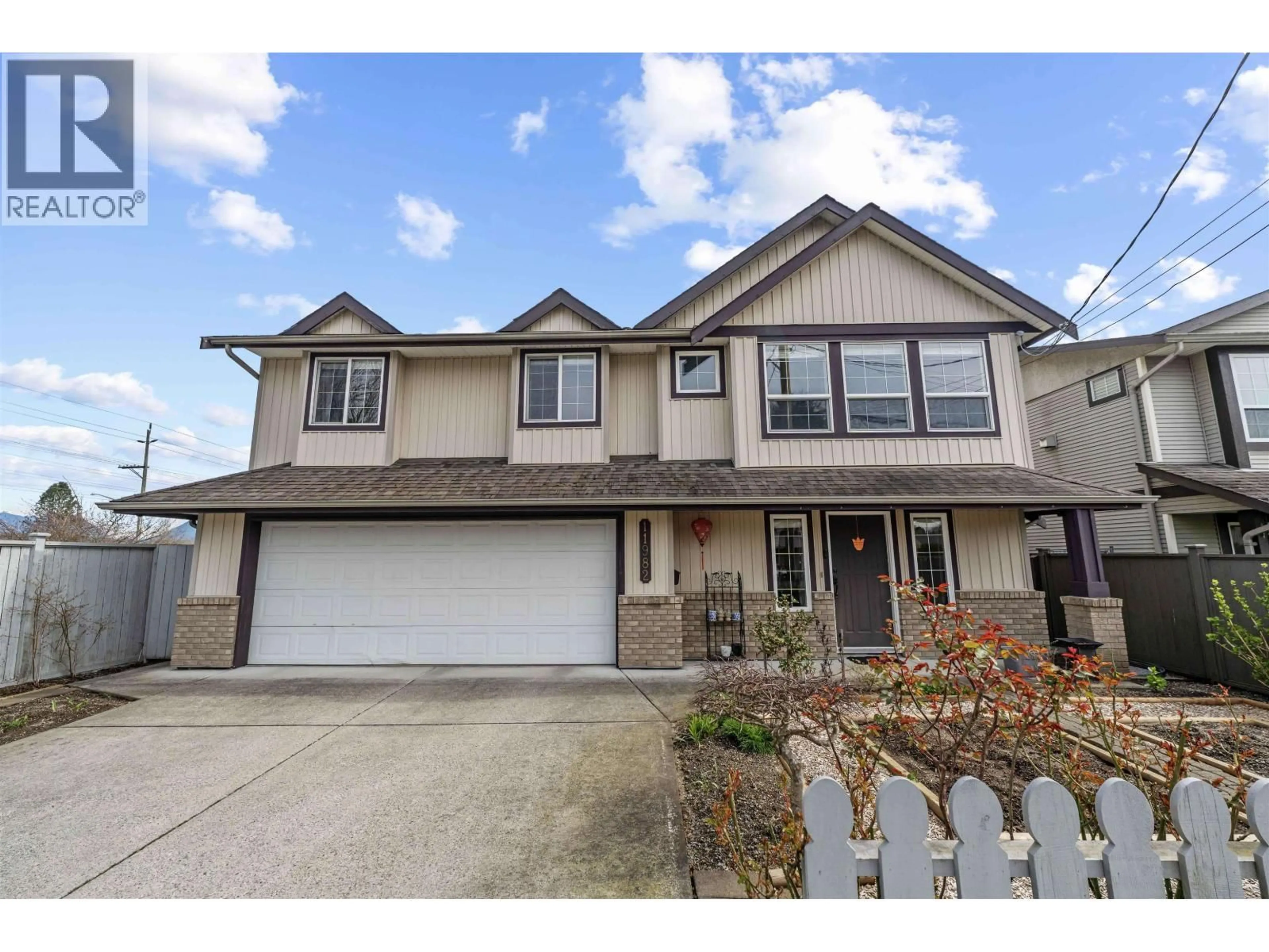Home with vinyl exterior material, street for 11982 230 STREET, Maple Ridge British Columbia V2X7Z8