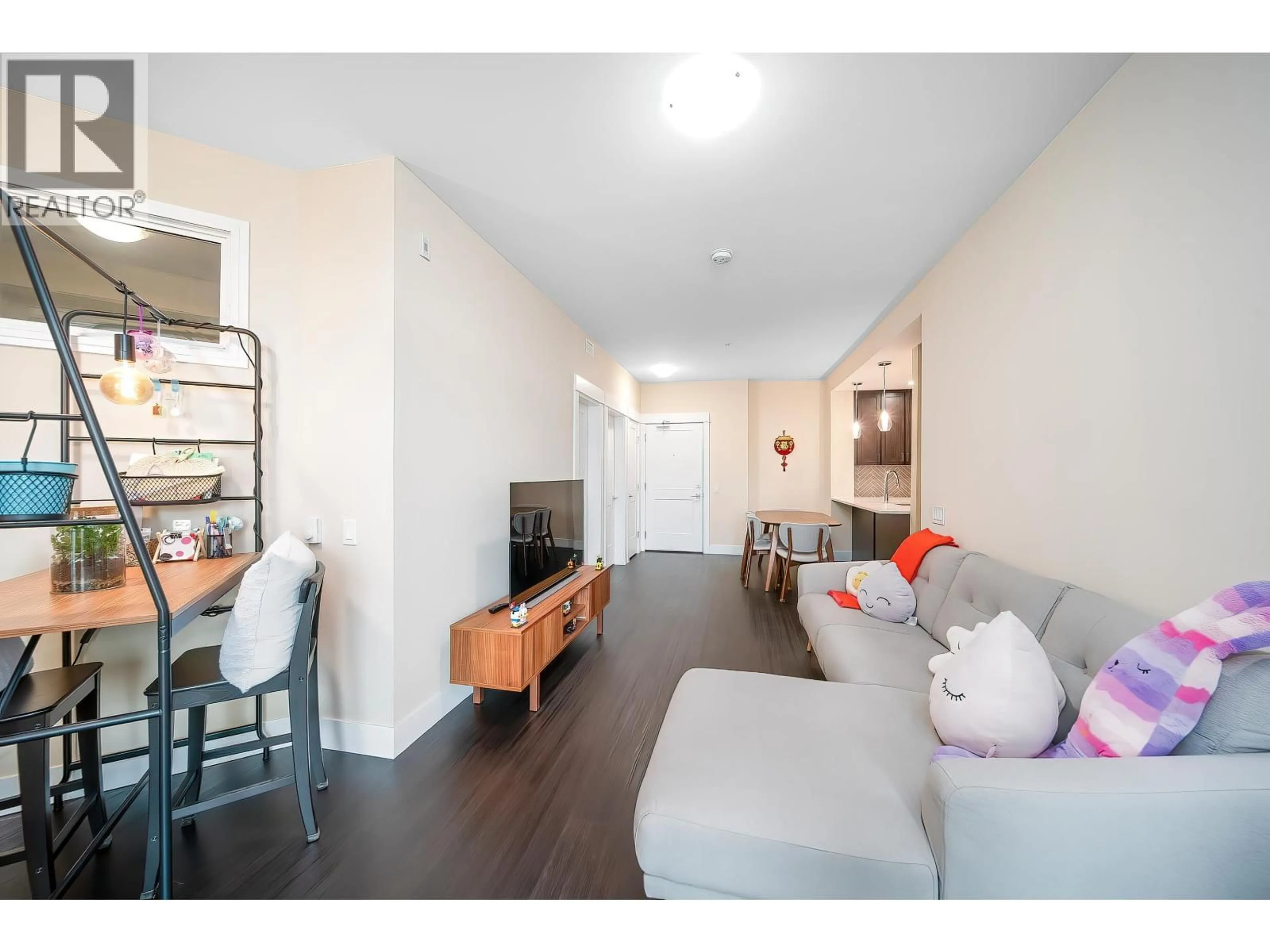 Living room with furniture, wood/laminate floor for 4520 - 2180 KELLY AVENUE, Port Coquitlam British Columbia V3C0L1