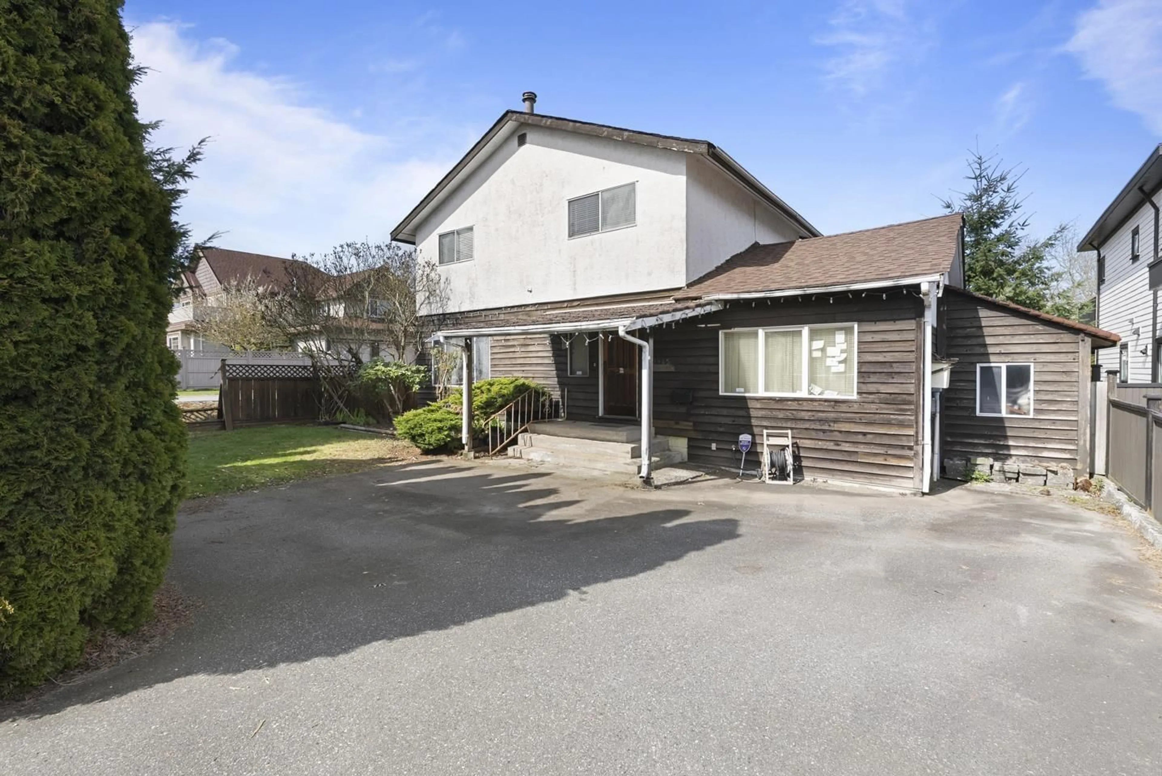 A pic from outside/outdoor area/front of a property/back of a property/a pic from drone, street for 12945 64 AVENUE, Surrey British Columbia V3W1X4