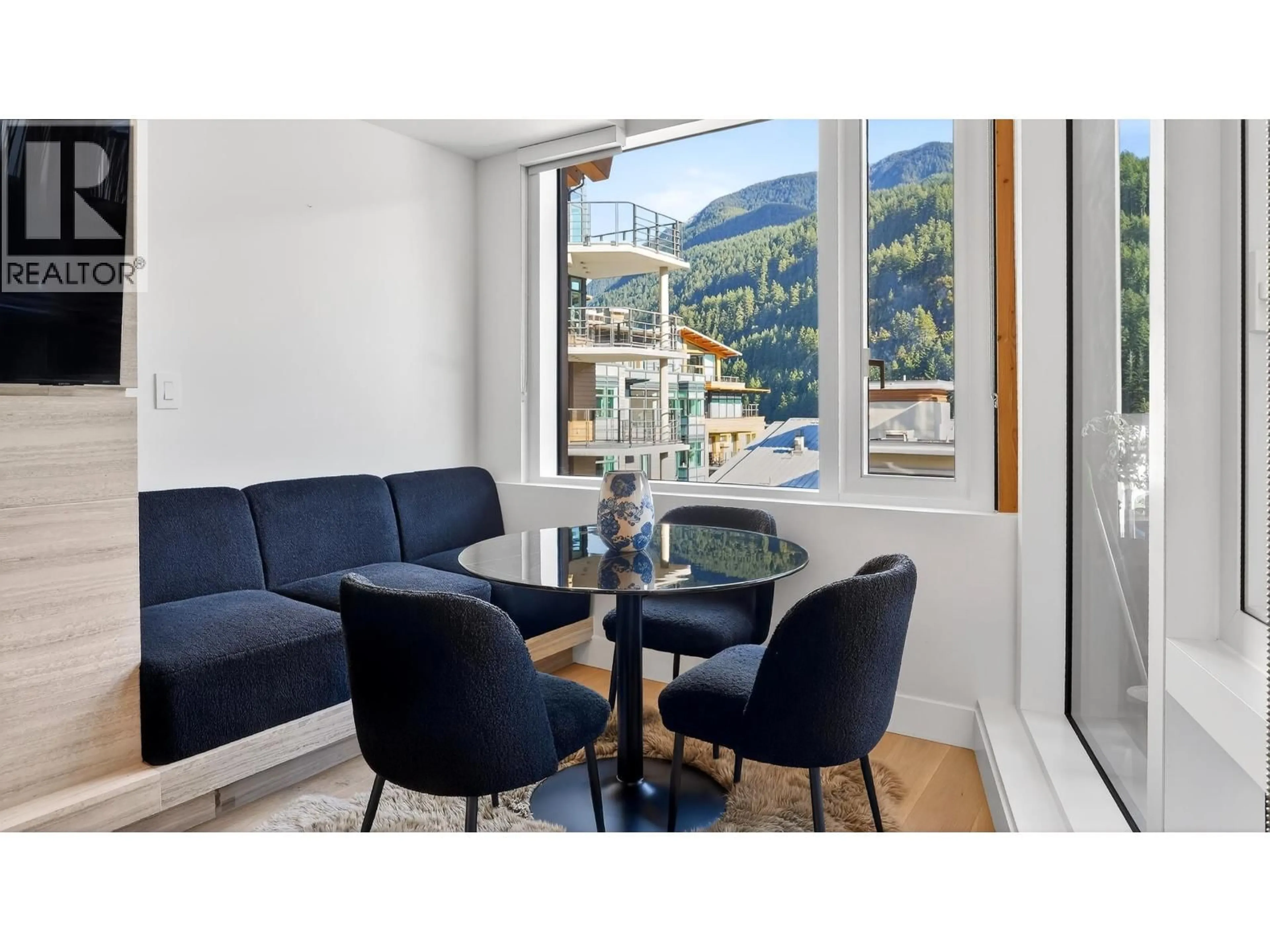 Living room with furniture, wood/laminate floor for 506 - 6687 NELSON AVENUE, West Vancouver British Columbia V7W2B2