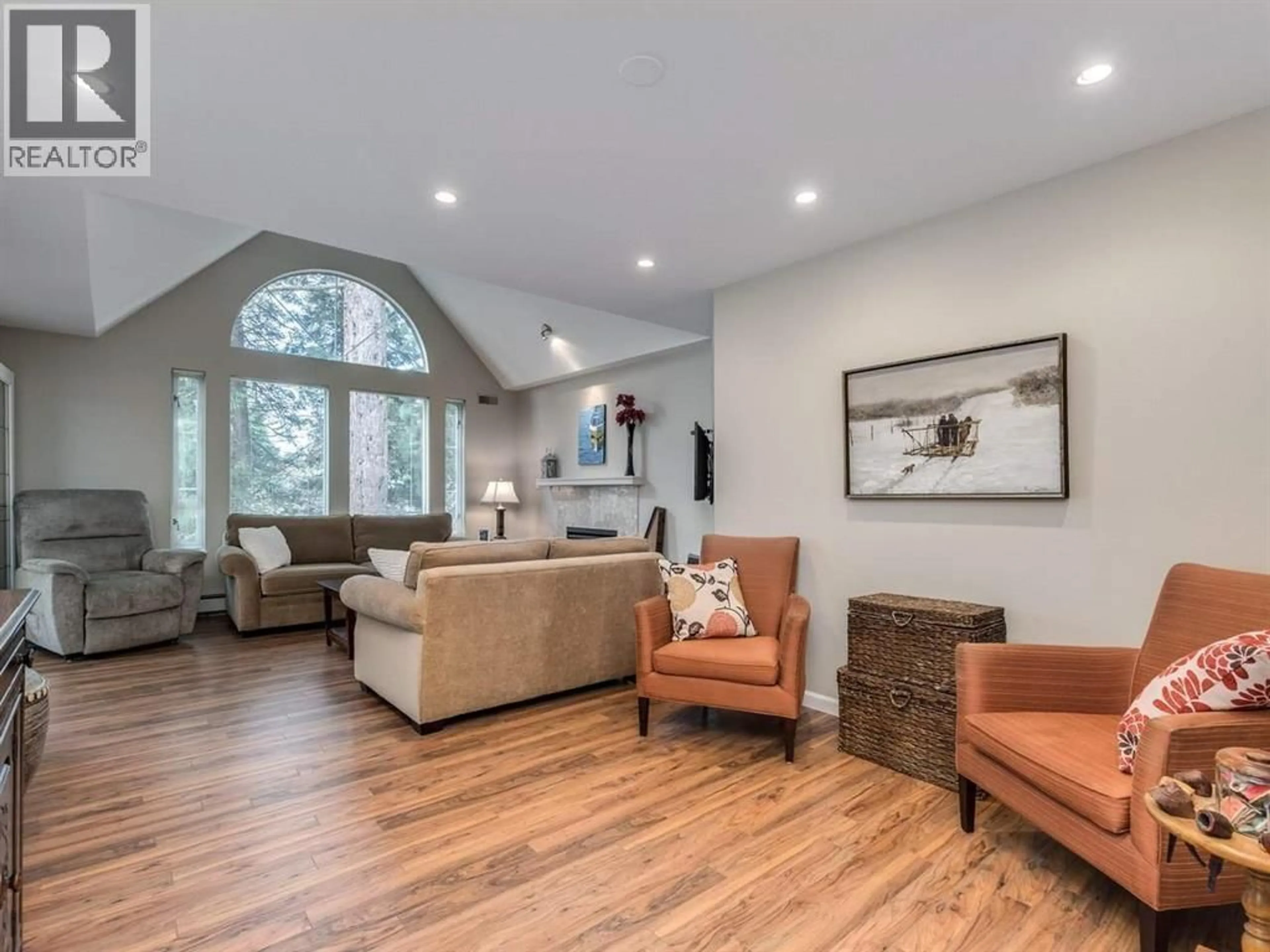 Living room with furniture, wood/laminate floor for 304 - 1675 AUGUSTA AVENUE, Burnaby British Columbia V5A4S8