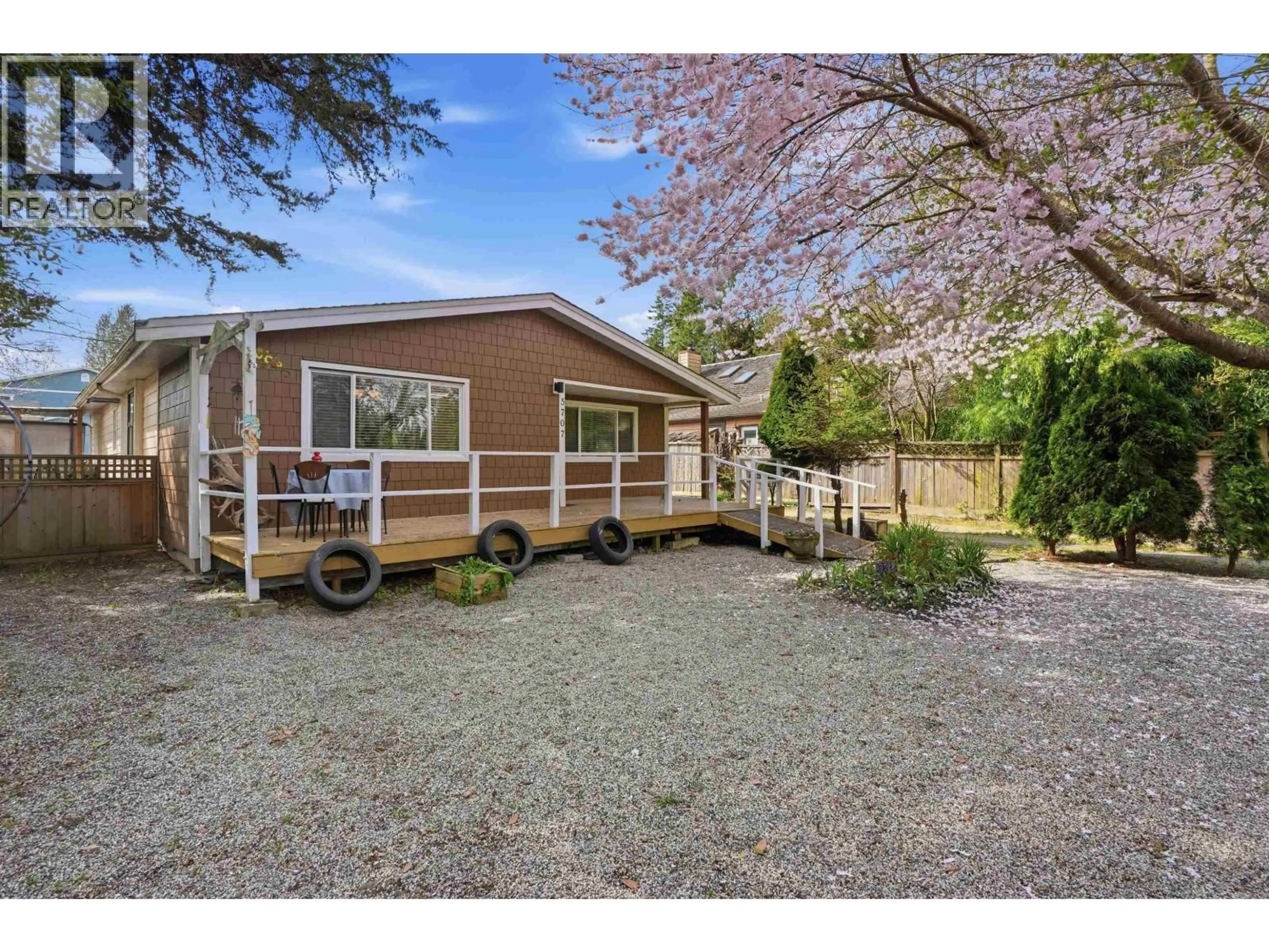 A pic from outside/outdoor area/front of a property/back of a property/a pic from drone, street for 5707 MEDUSA STREET, Sechelt British Columbia V0N3A0