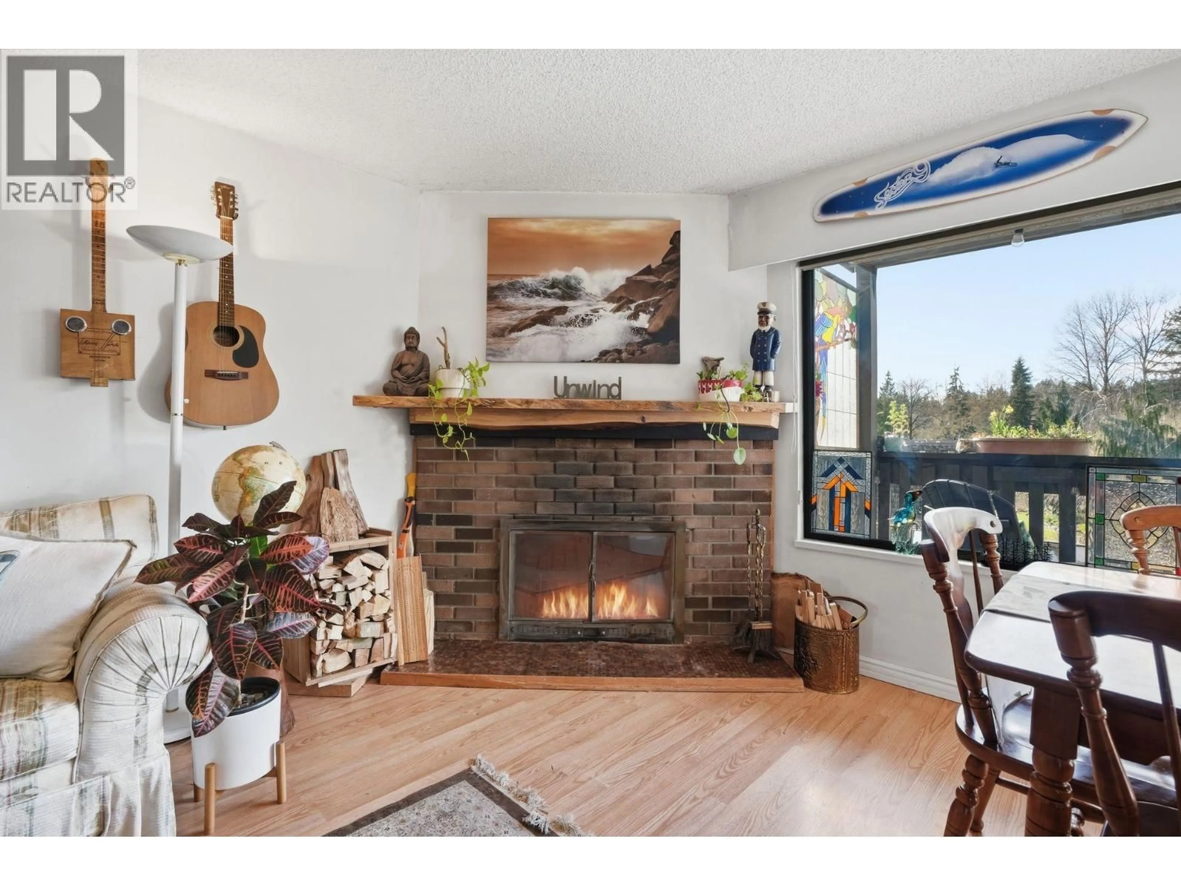 Living room with furniture, wood/laminate floor for 1021 OLD LILLOOET ROAD, North Vancouver British Columbia V7J3H6