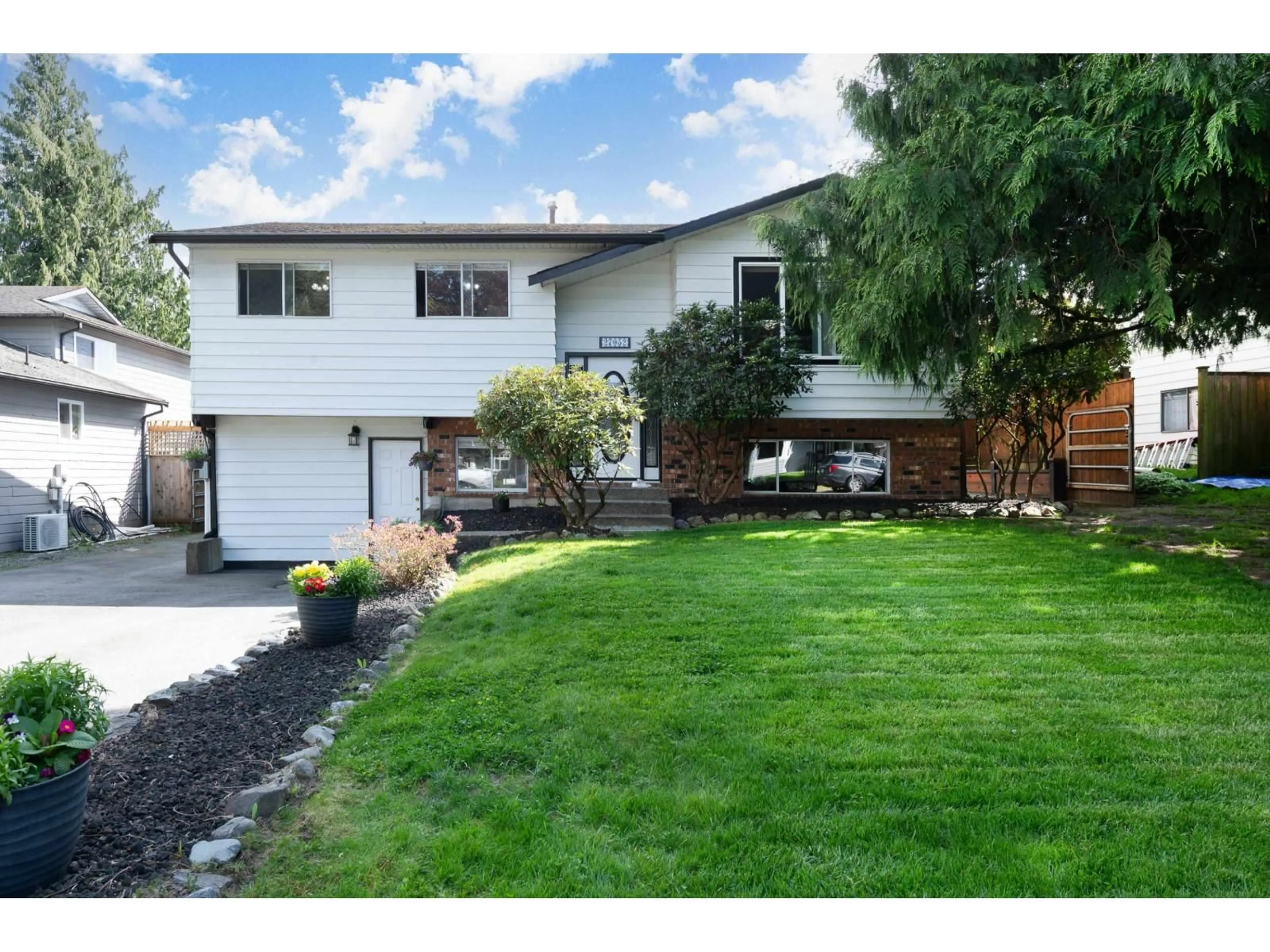 Home with vinyl exterior material, street for 30 - 27052 34A AVENUE, Langley British Columbia V4W3H3