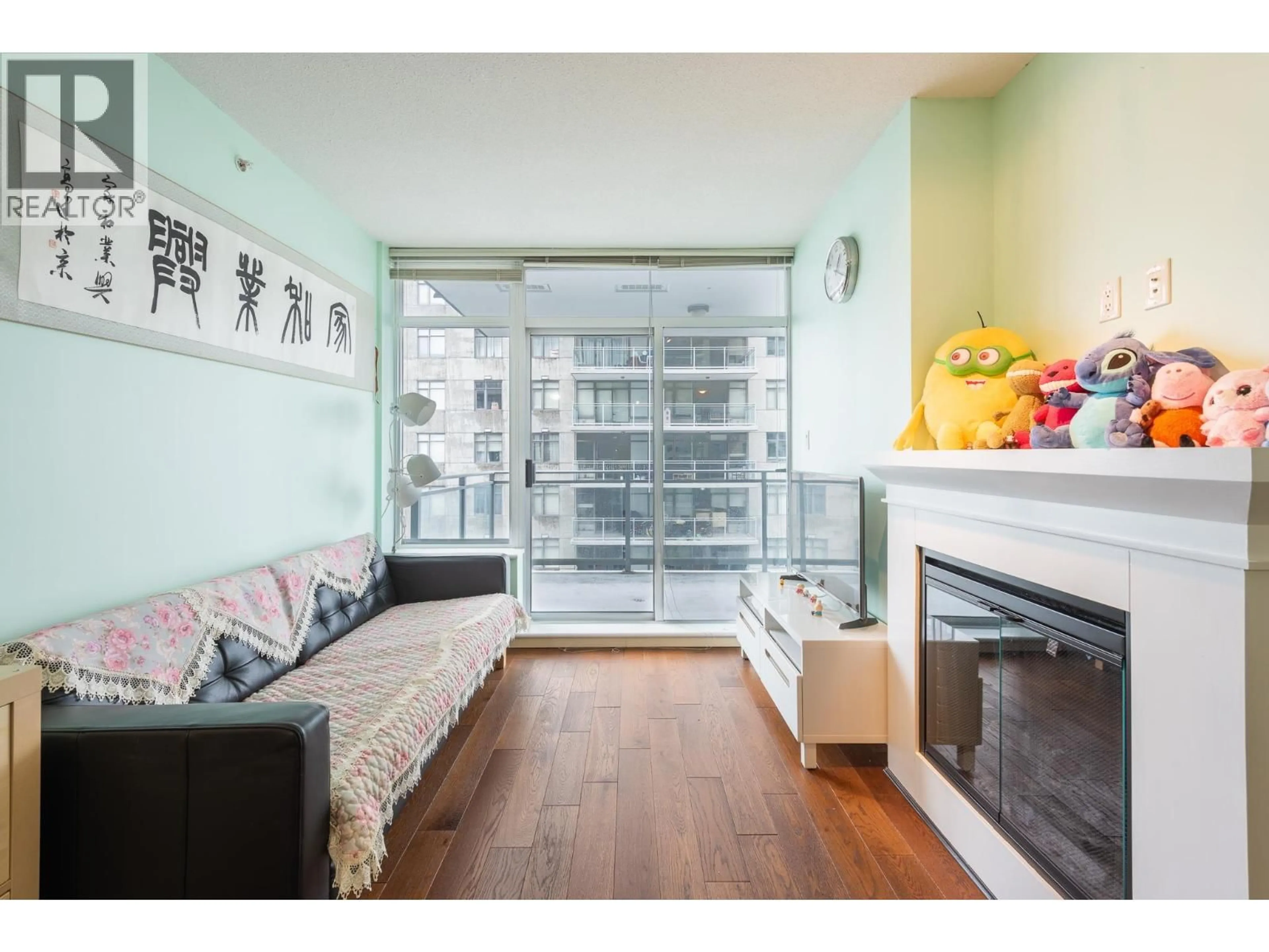 Living room with furniture, wood/laminate floor for 2310 - 892 CARNARVON STREET, New Westminster British Columbia V3M0C5