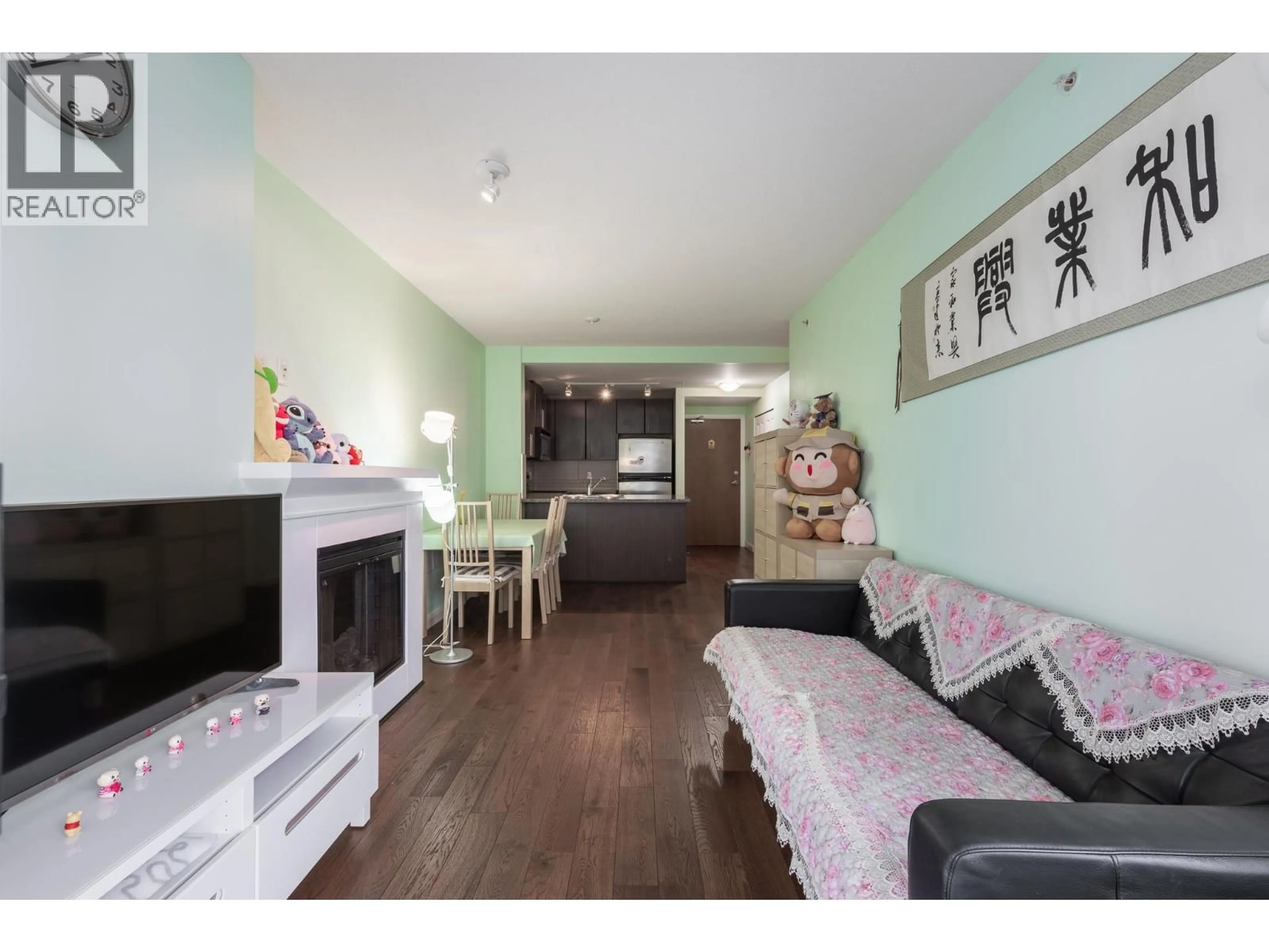 Living room with furniture, wood/laminate floor for 2310 - 892 CARNARVON STREET, New Westminster British Columbia V3M0C5