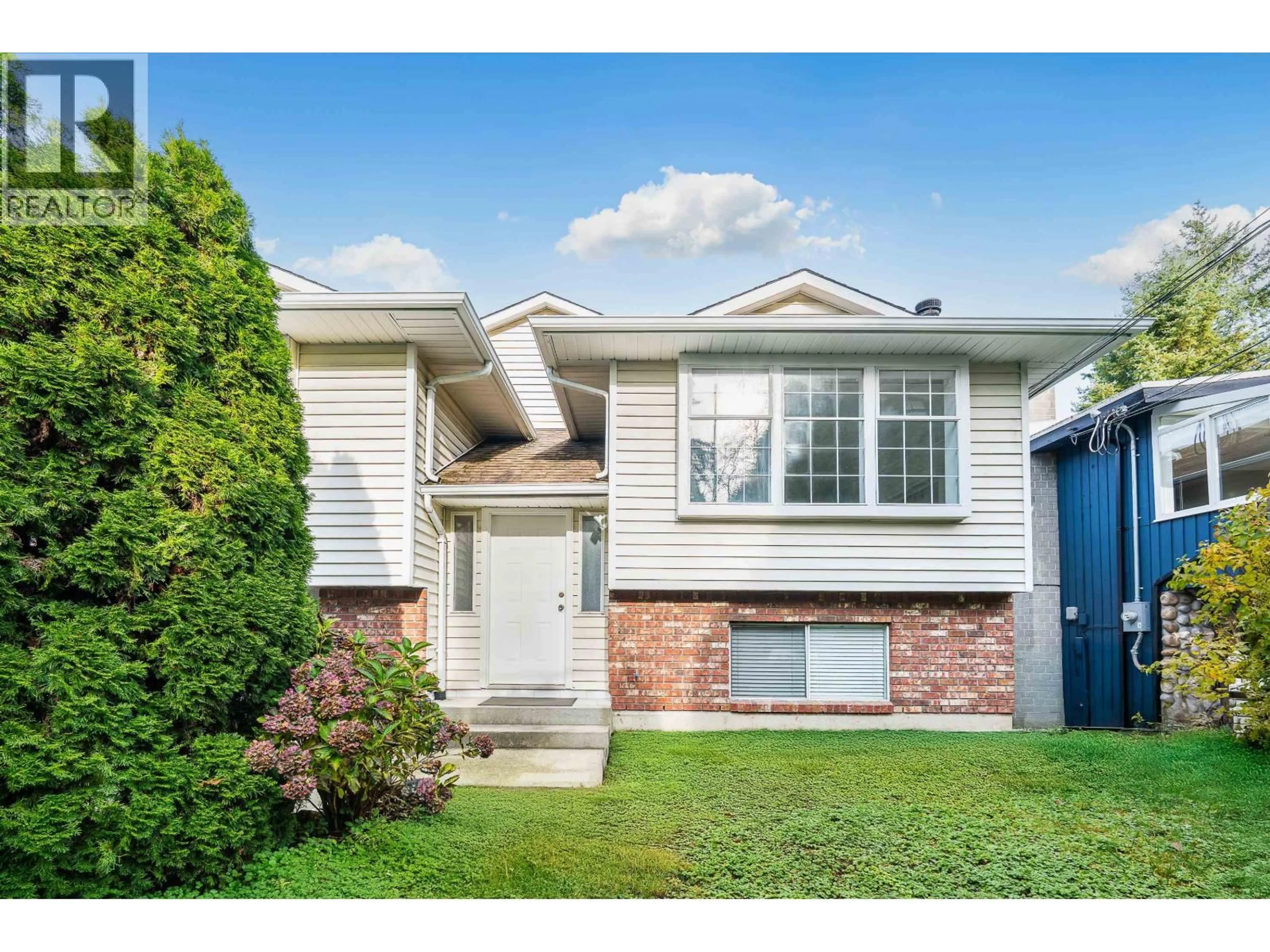 Home with vinyl exterior material, street for 3868 MT SEYMOUR PARKWAY, North Vancouver British Columbia V7G1C4