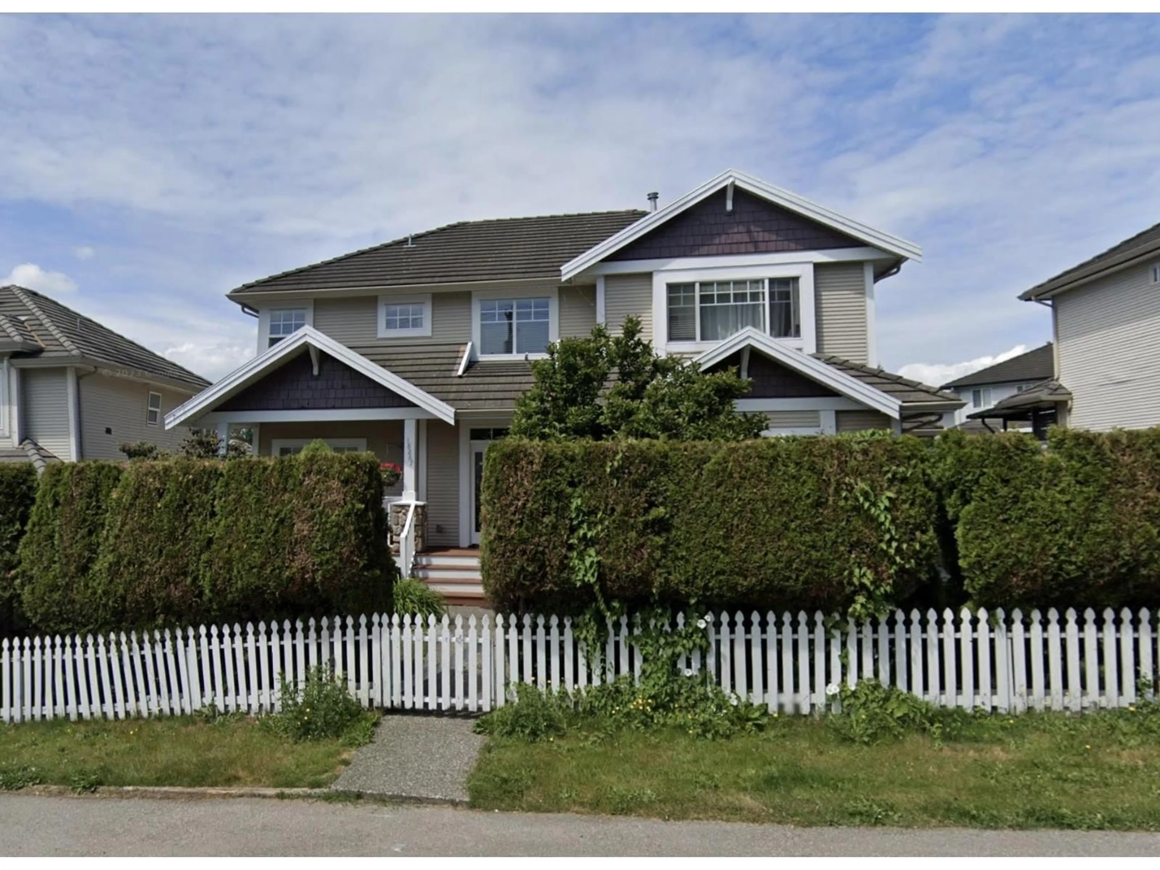 Home with vinyl exterior material, street for 18267 64 AVENUE, Surrey British Columbia V3S0M3