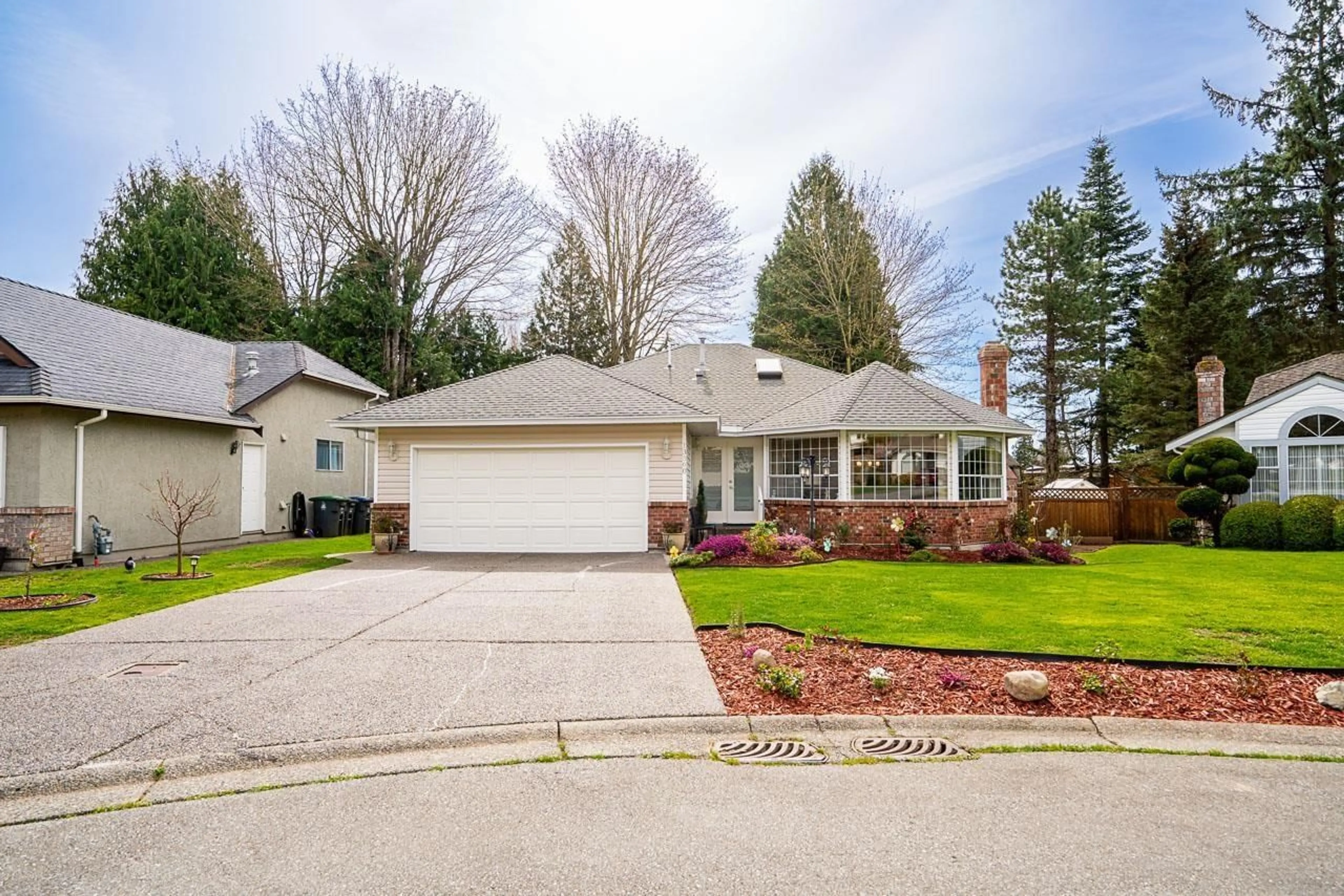 Home with vinyl exterior material, street for 13560 15A AVENUE, Surrey British Columbia V4A8Z9