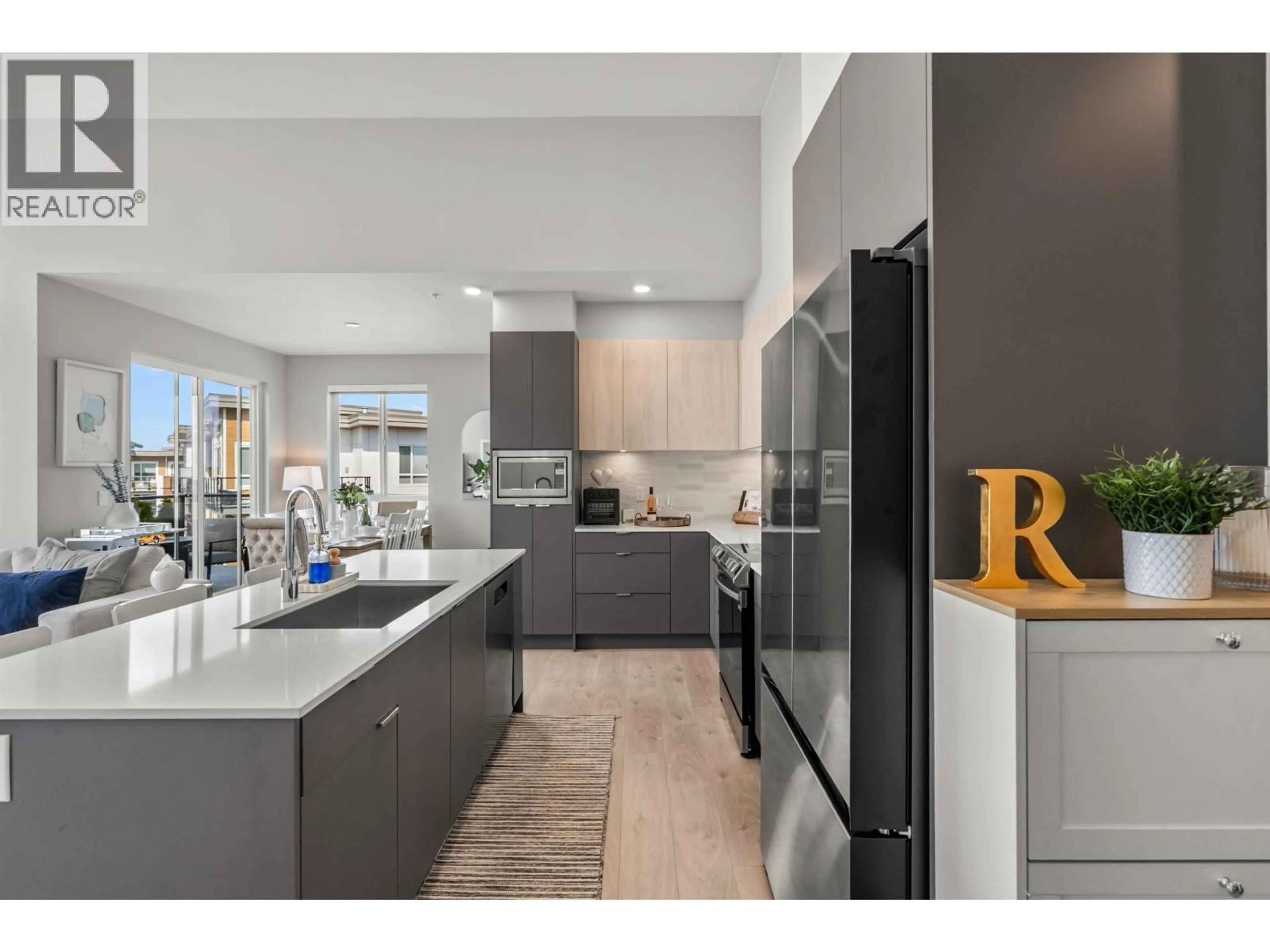 Open concept kitchen, ceramic/tile floor for 615 - 2431 RABBIT DRIVE, Delta British Columbia V4M0G5