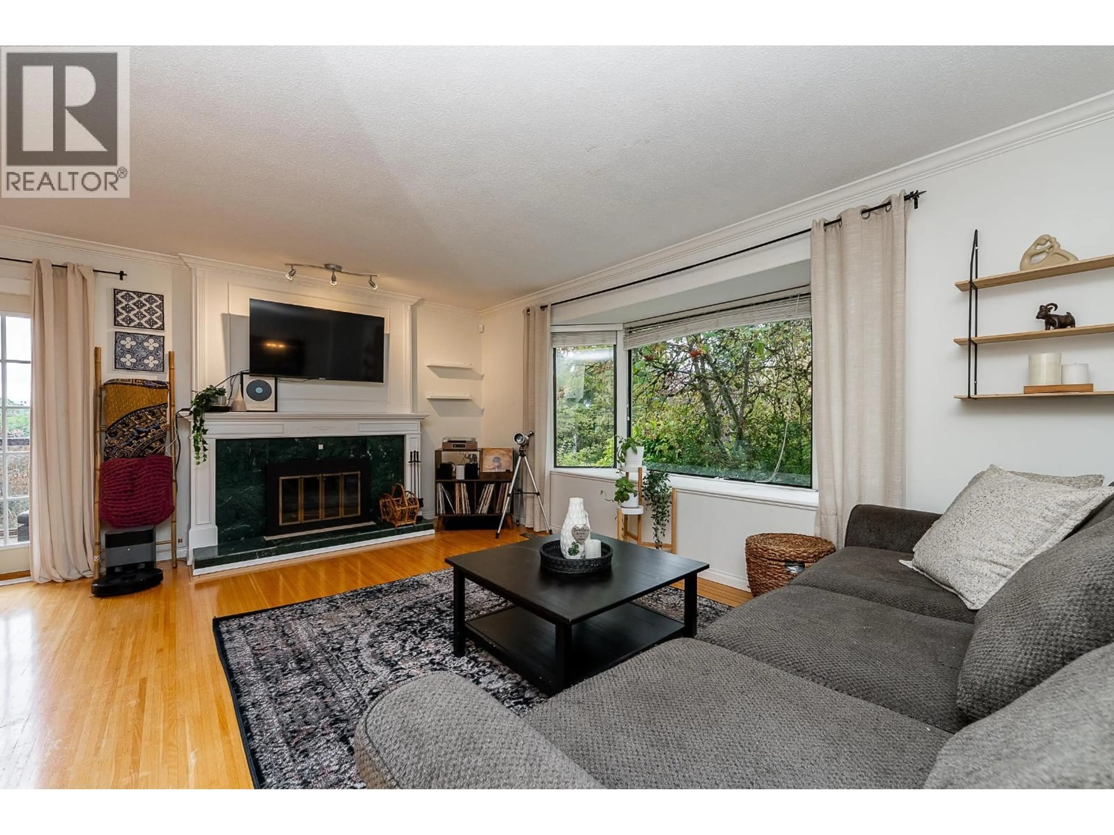 Living room with furniture, wood/laminate floor for 2988 FLEET STREET, Coquitlam British Columbia V3C3R8