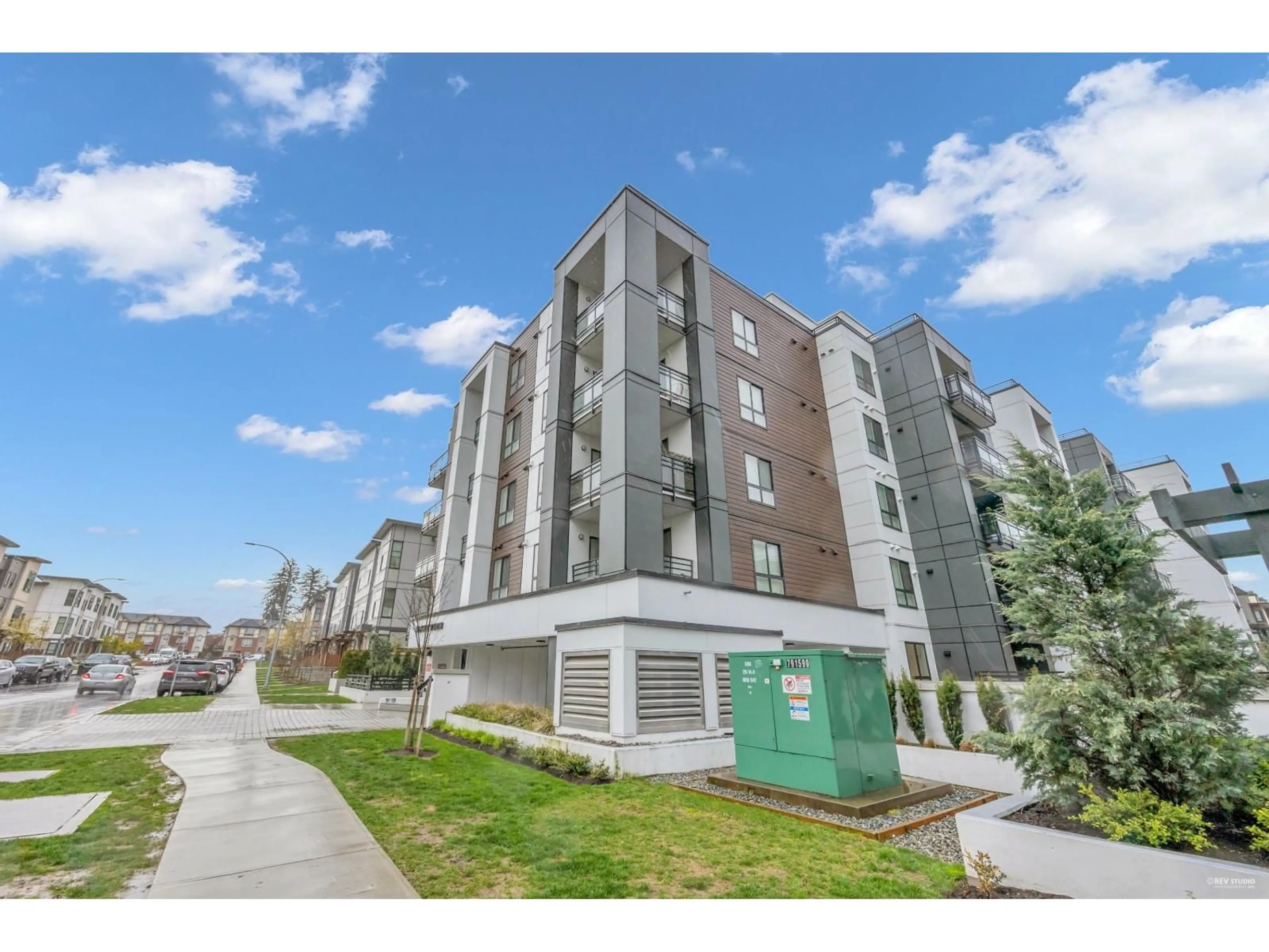 A pic from outside/outdoor area/front of a property/back of a property/a pic from drone, street for B211 - 20838 78B AVENUE, Langley British Columbia V2Y3M2