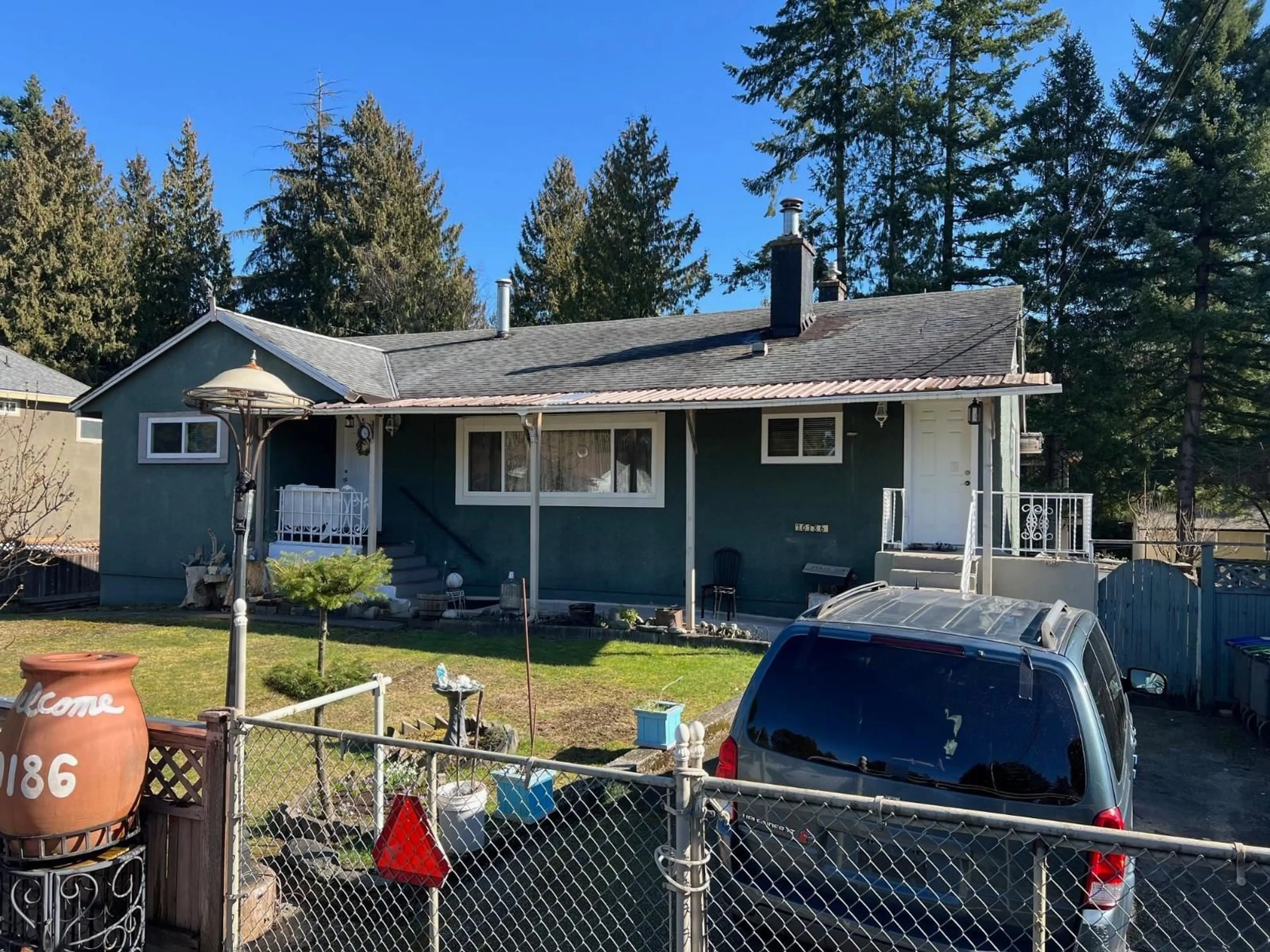 Home with vinyl exterior material, street for 10186 144A STREET, Surrey British Columbia V3R3P8