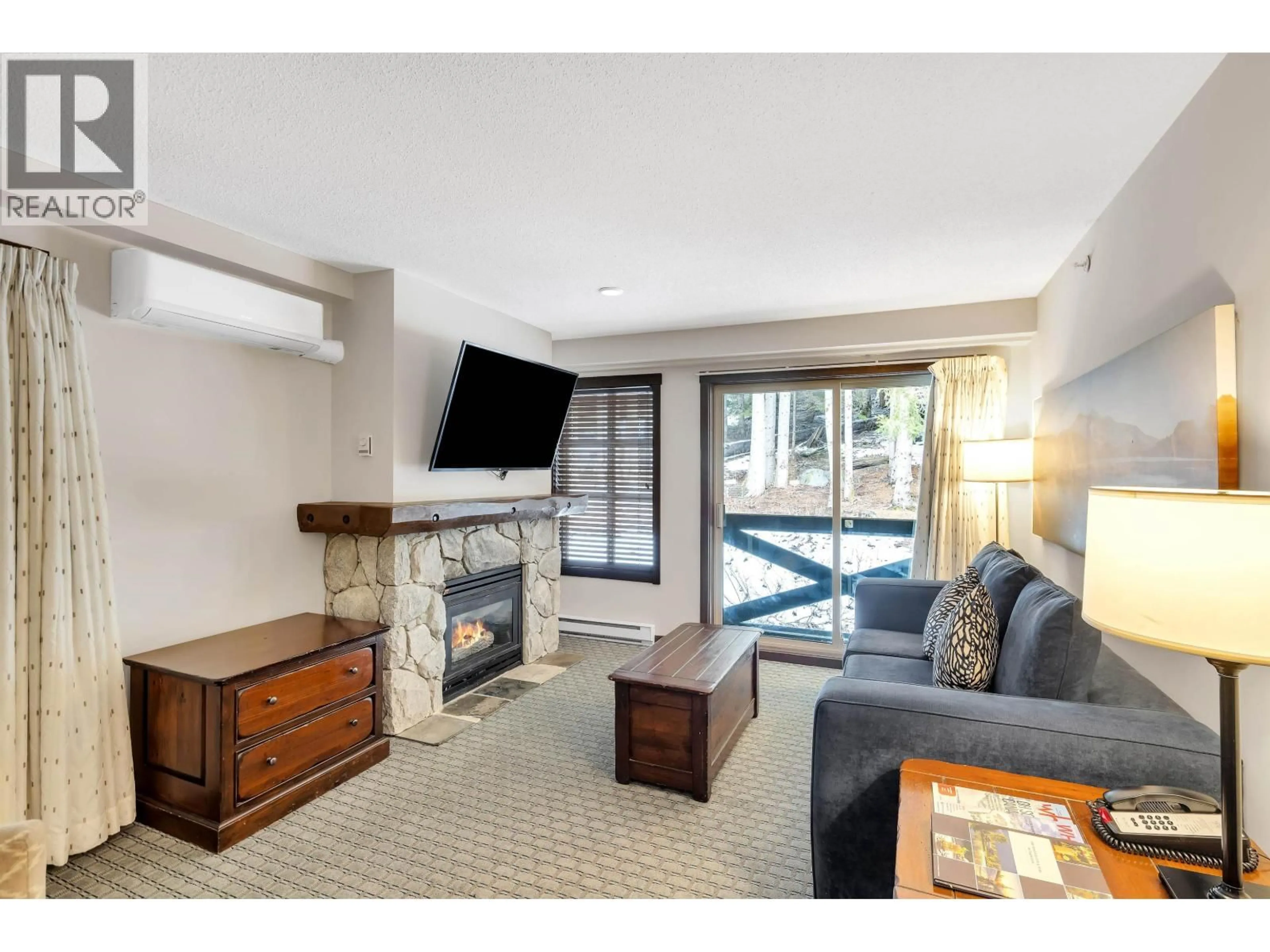 Living room with furniture, unknown for 424 - 4899 PAINTED CLIFF ROAD, Whistler British Columbia V8E1E2