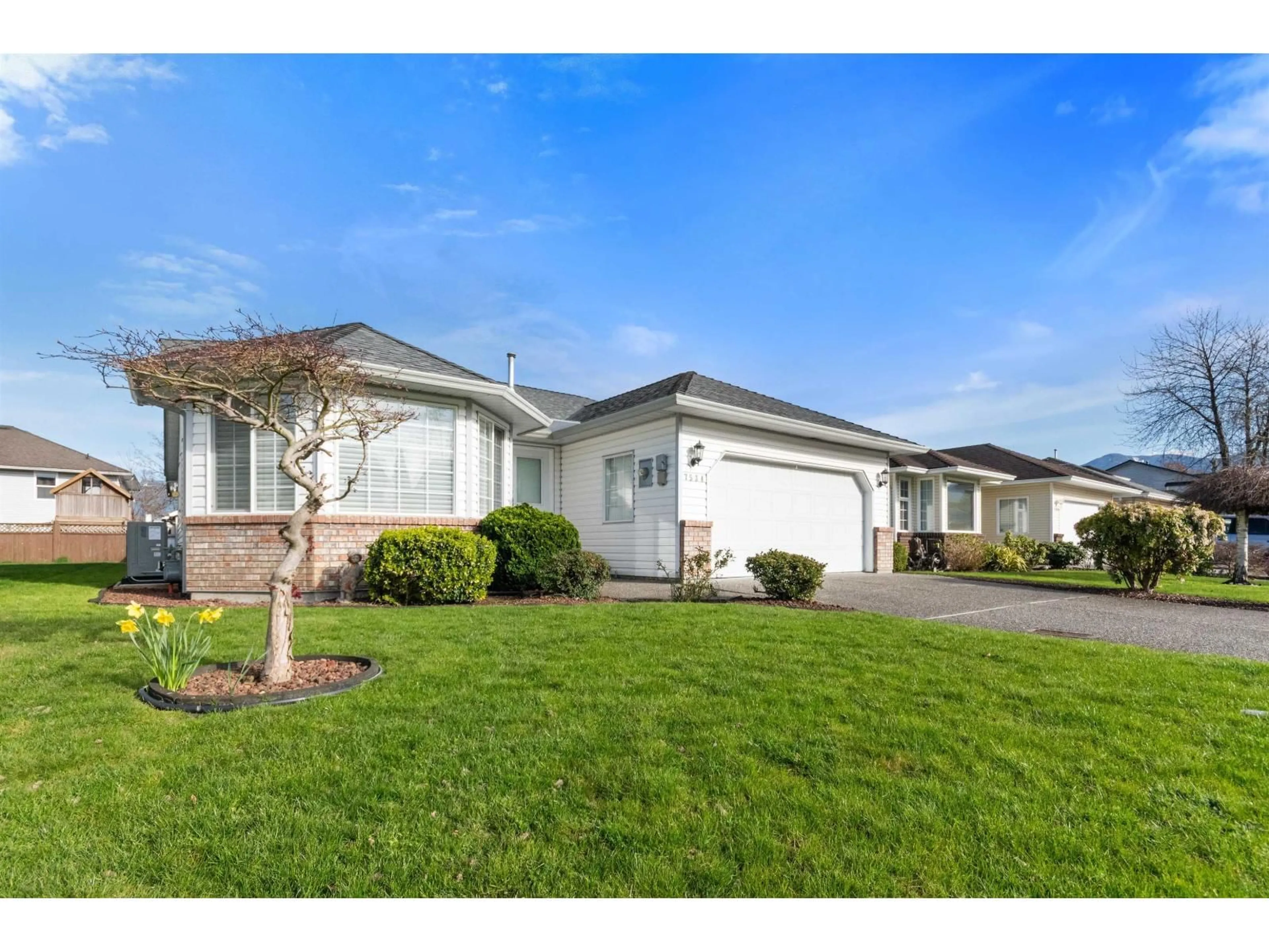 Home with vinyl exterior material, street for 7534 GARNET DRIVE, Chilliwack British Columbia V2R3A9