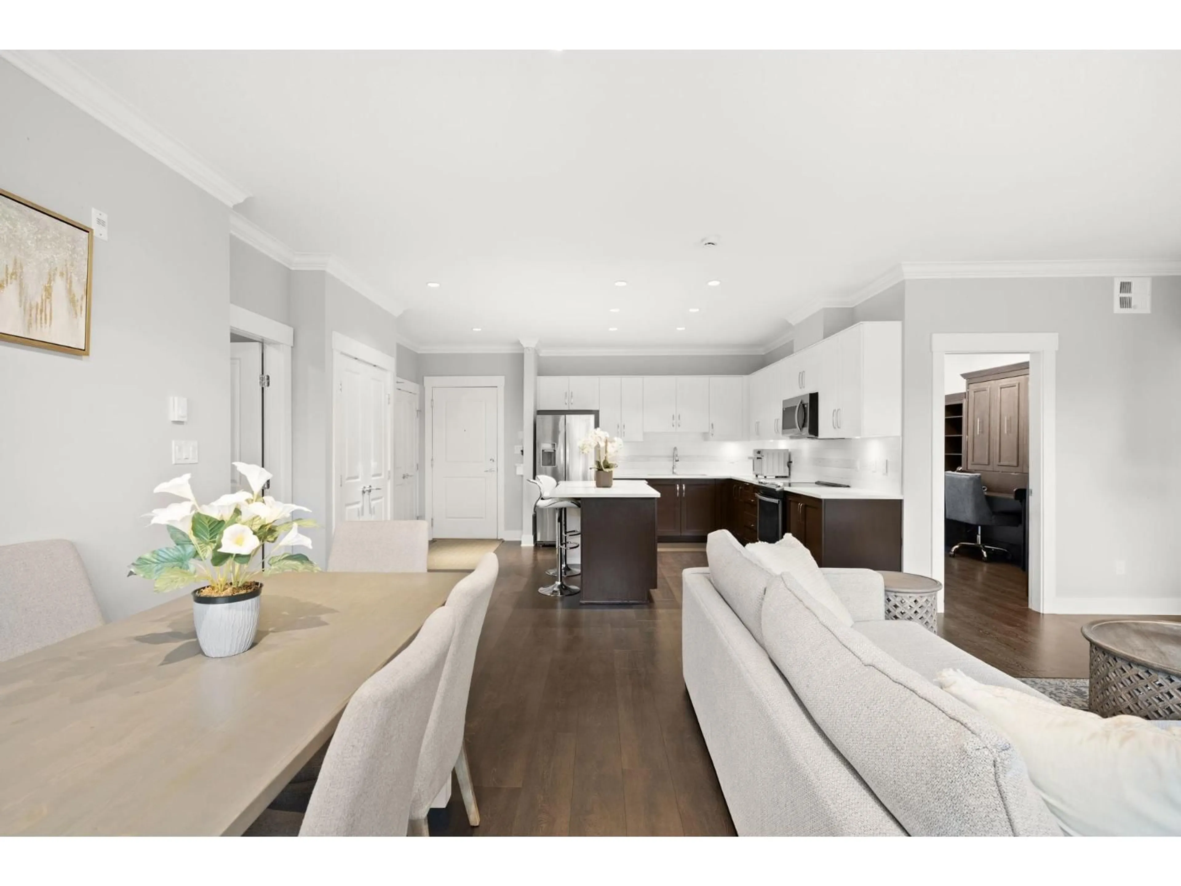 Open concept kitchen, wood/laminate floor for 419 - 20728 WILLOUGHBY TOWN CENTRE DRIVE, Langley British Columbia V2Y0P3