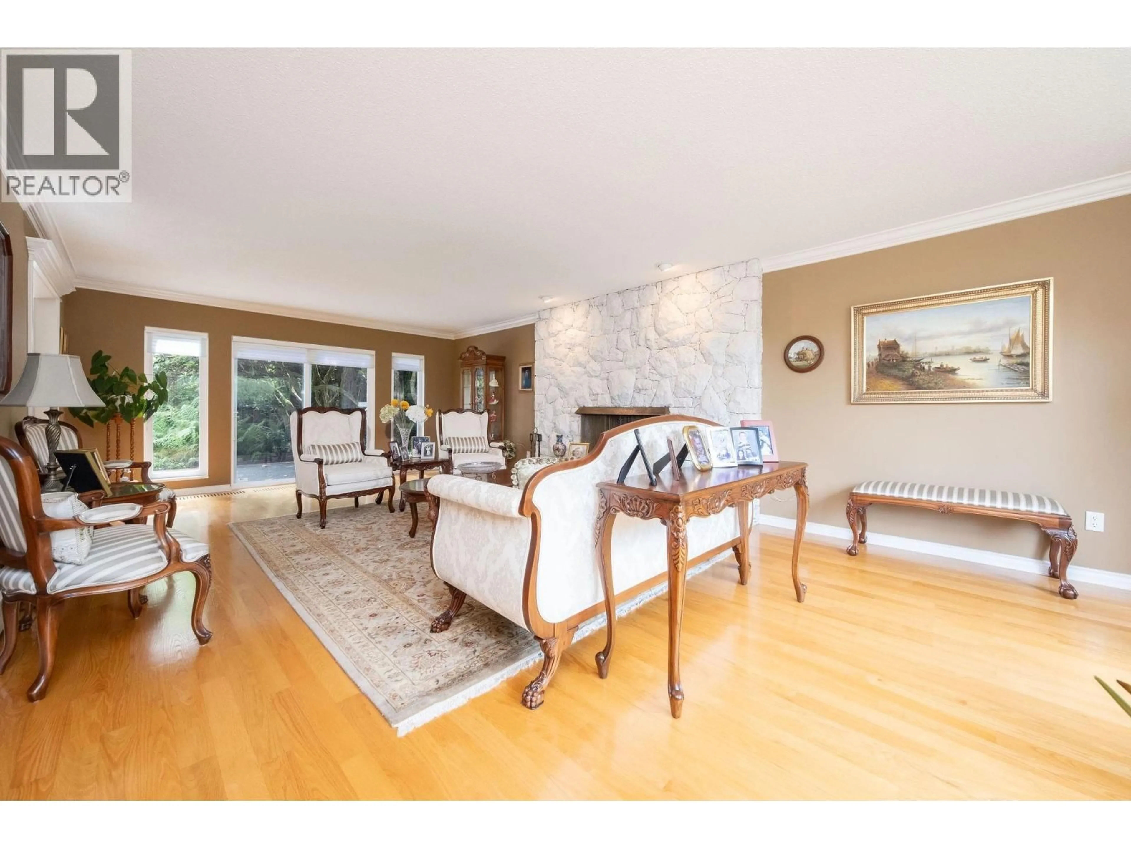 Living room with furniture, wood/laminate floor for 6350 BUCKINGHAM DRIVE, Burnaby British Columbia V5E2A7