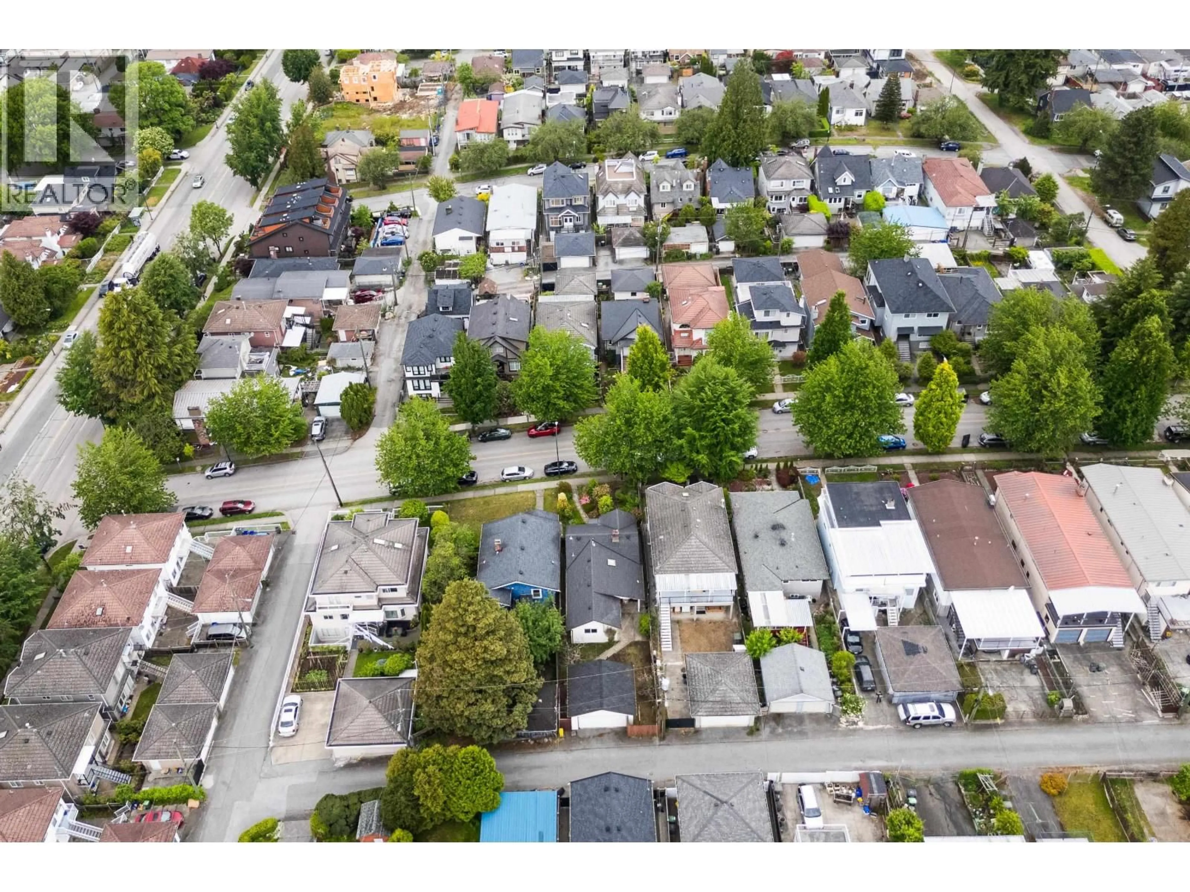 A pic from outside/outdoor area/front of a property/back of a property/a pic from drone, street for 2448 EAST 29TH AVENUE, Vancouver British Columbia V5R1T9