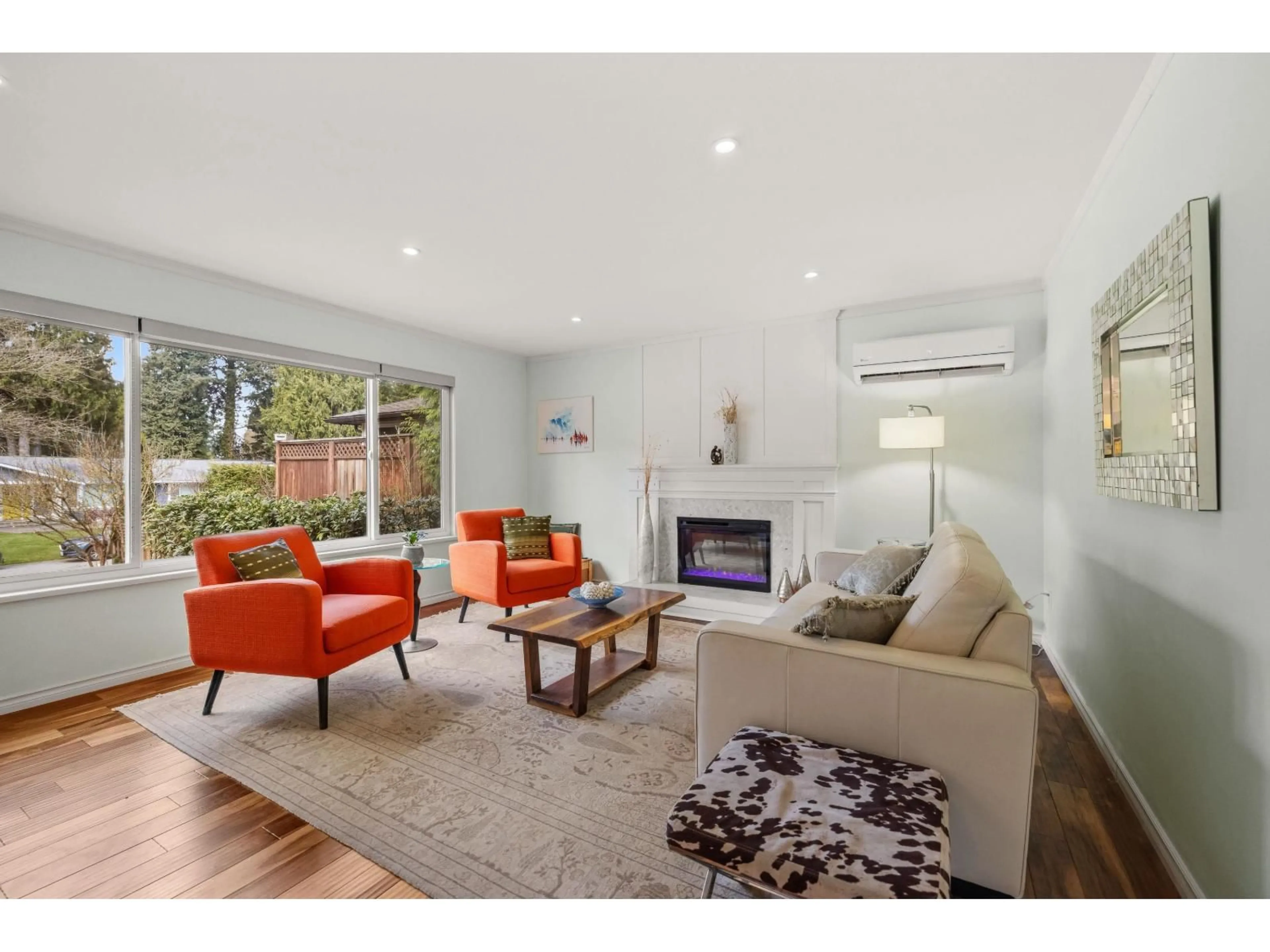 Living room with furniture, wood/laminate floor for 20238 49 AVENUE, Langley British Columbia V3A6W9