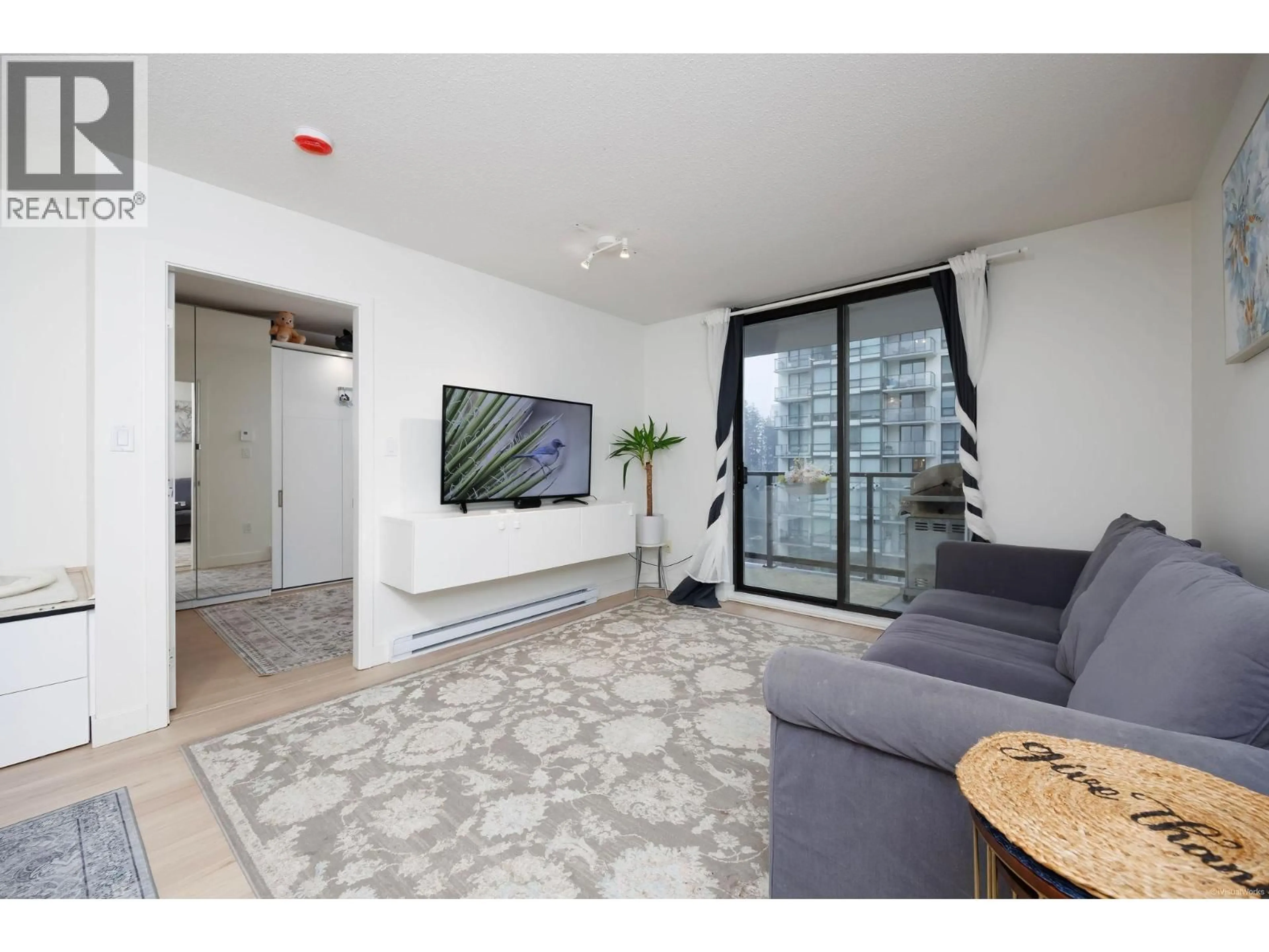 Living room with furniture, unknown for 1103 - 2979 GLEN DRIVE, Coquitlam British Columbia V3B0B2