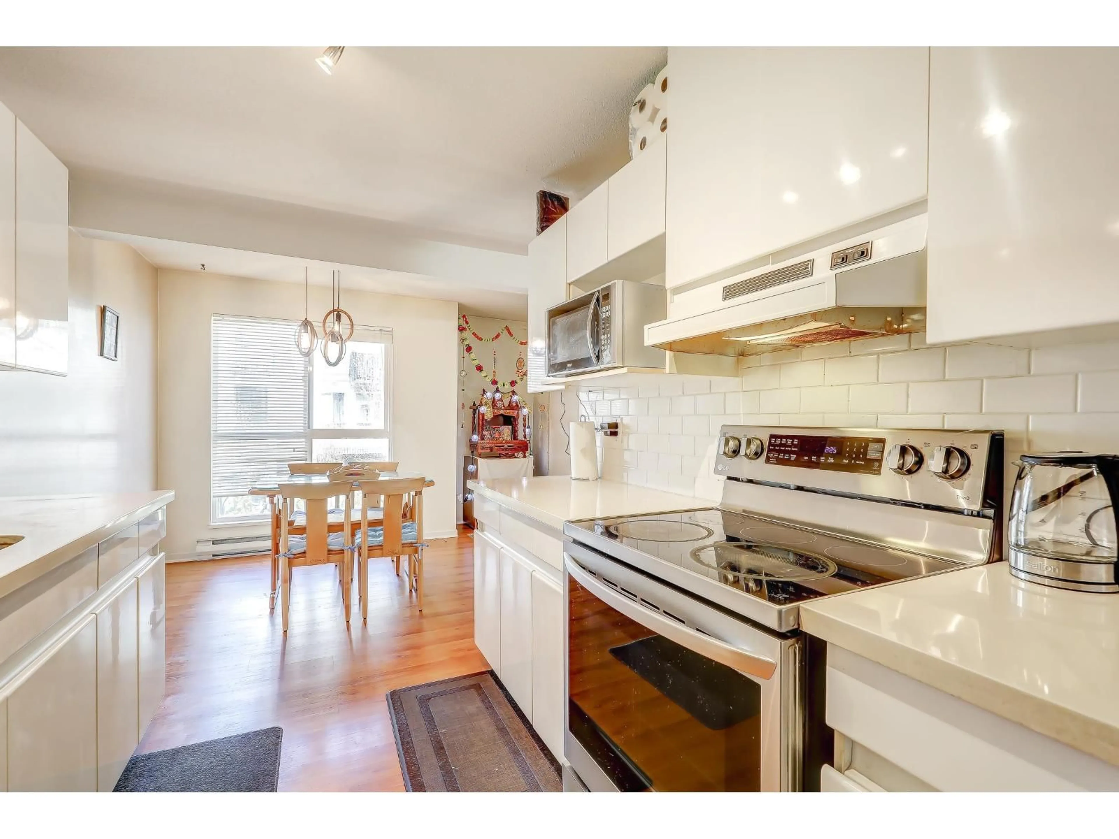 Open concept kitchen, unknown for 210 - 14980 101A AVENUE, Surrey British Columbia V3R0T1