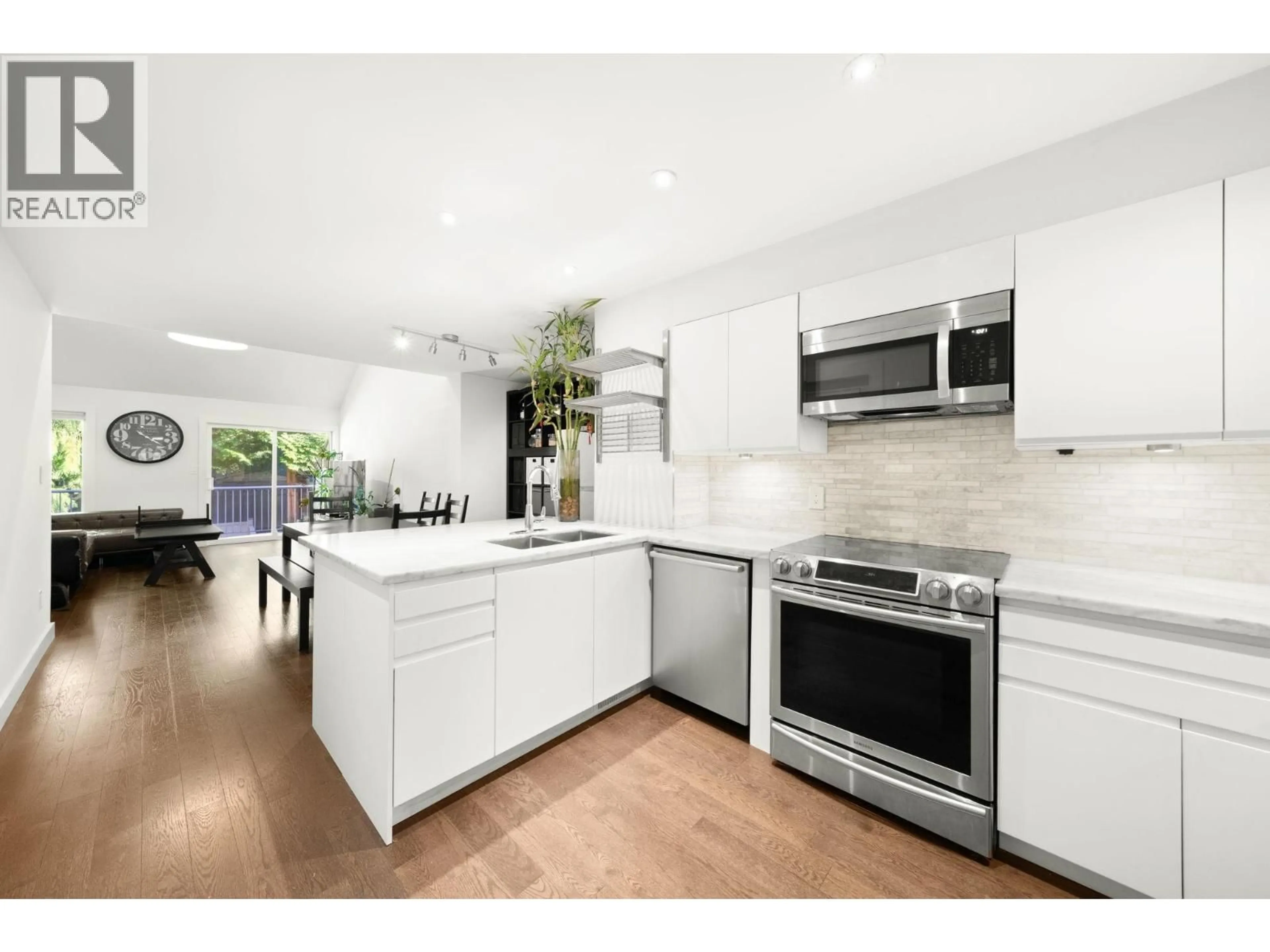 Open concept kitchen, ceramic/tile floor for 4707 CEDARGLEN PLACE, Burnaby British Columbia V5G4B6