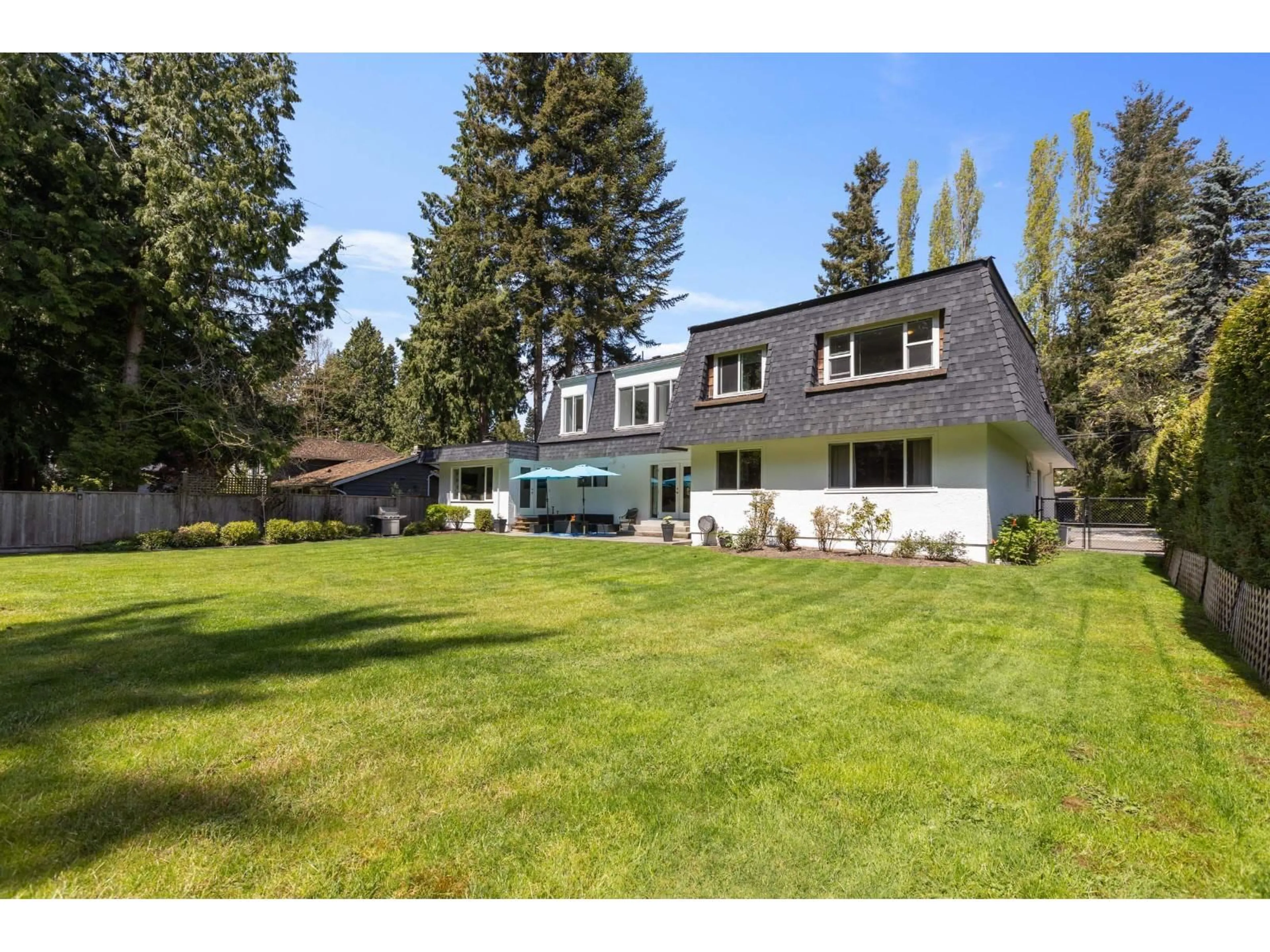 Home with vinyl exterior material, mountain view for 12688 23 AVENUE, Surrey British Columbia V4A2C7