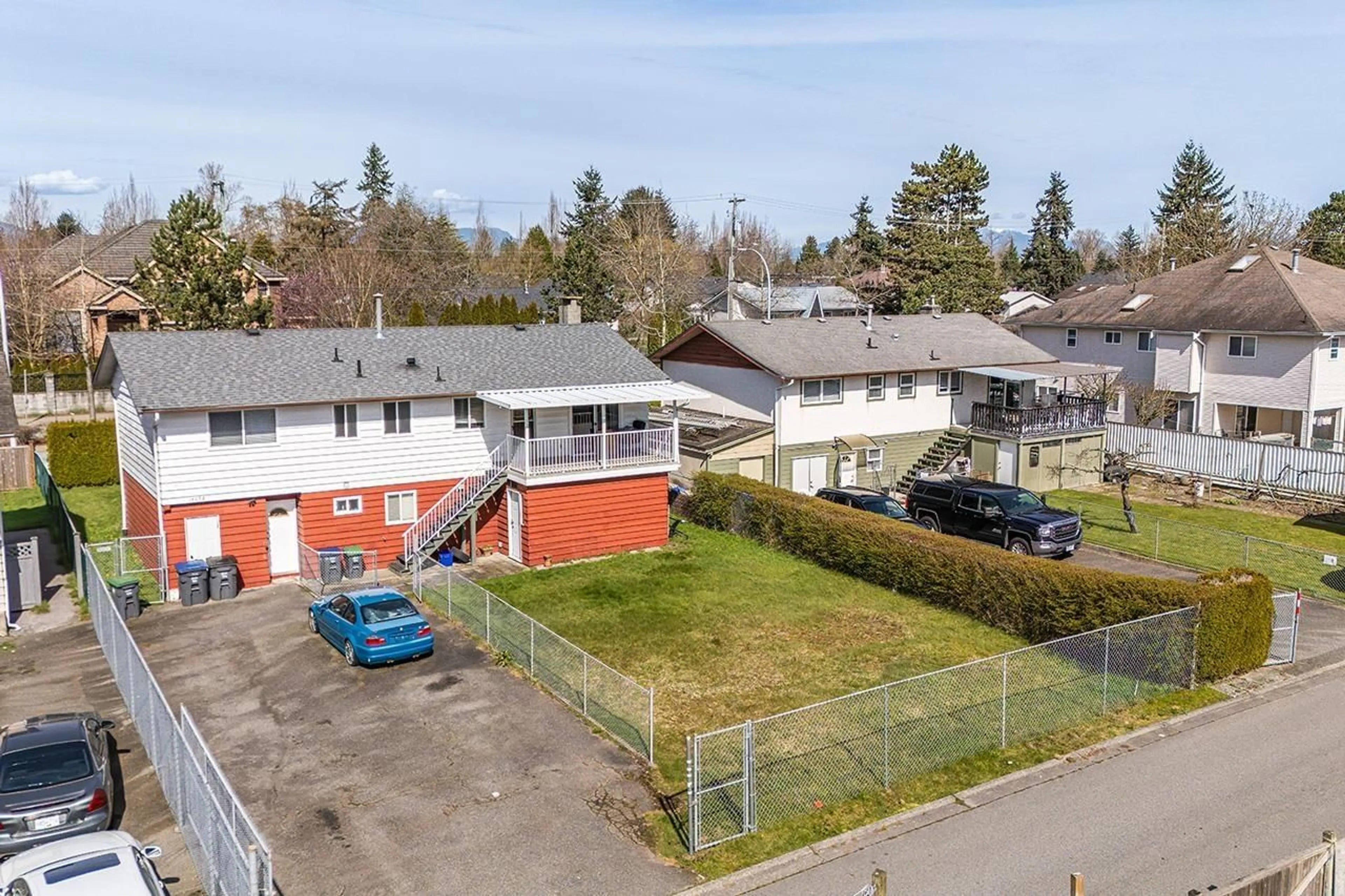 A pic from outside/outdoor area/front of a property/back of a property/a pic from drone, street for 14058 72 AVENUE, Surrey British Columbia V3W2P8