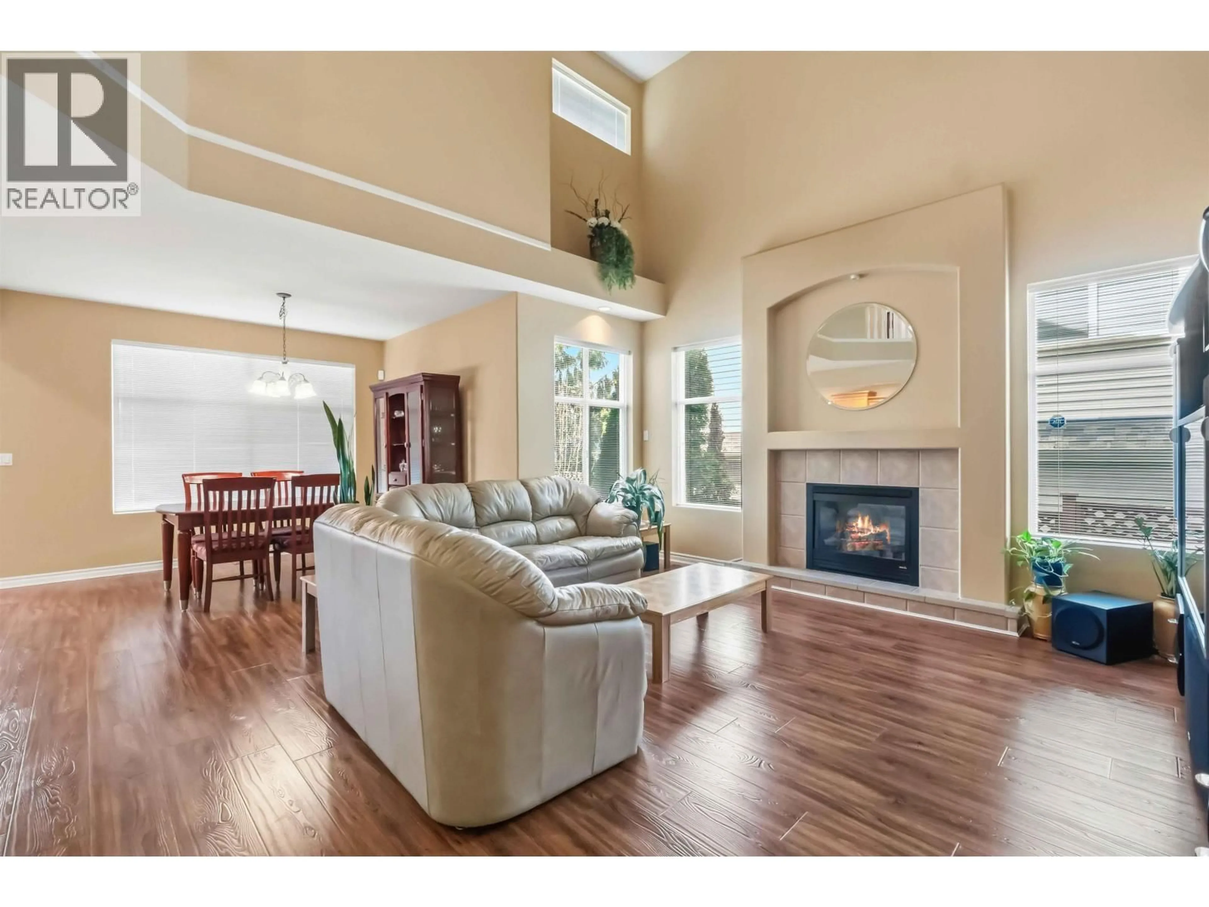 Living room with furniture, wood/laminate floor for 10097 241 STREET, Maple Ridge British Columbia V2W2C8