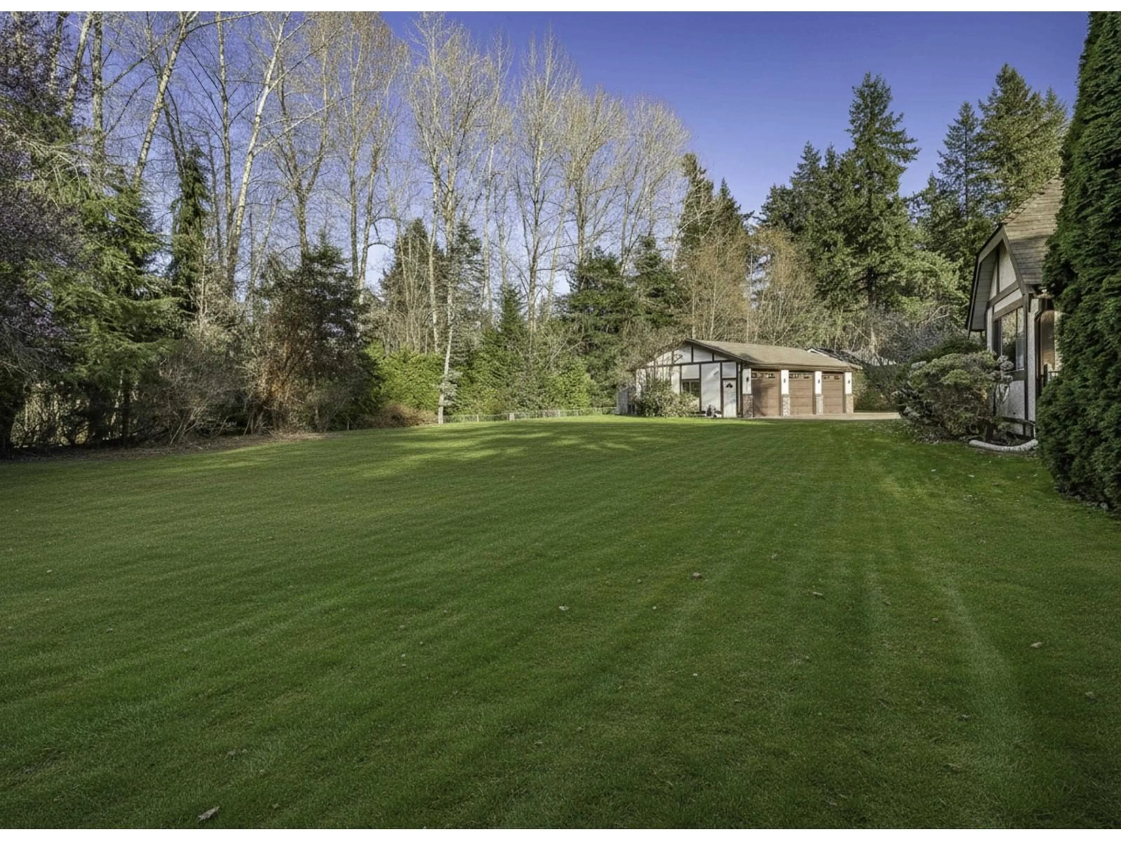 A pic from outside/outdoor area/front of a property/back of a property/a pic from drone, forest/trees view for 2570 142 STREET, Surrey British Columbia V4P2G3