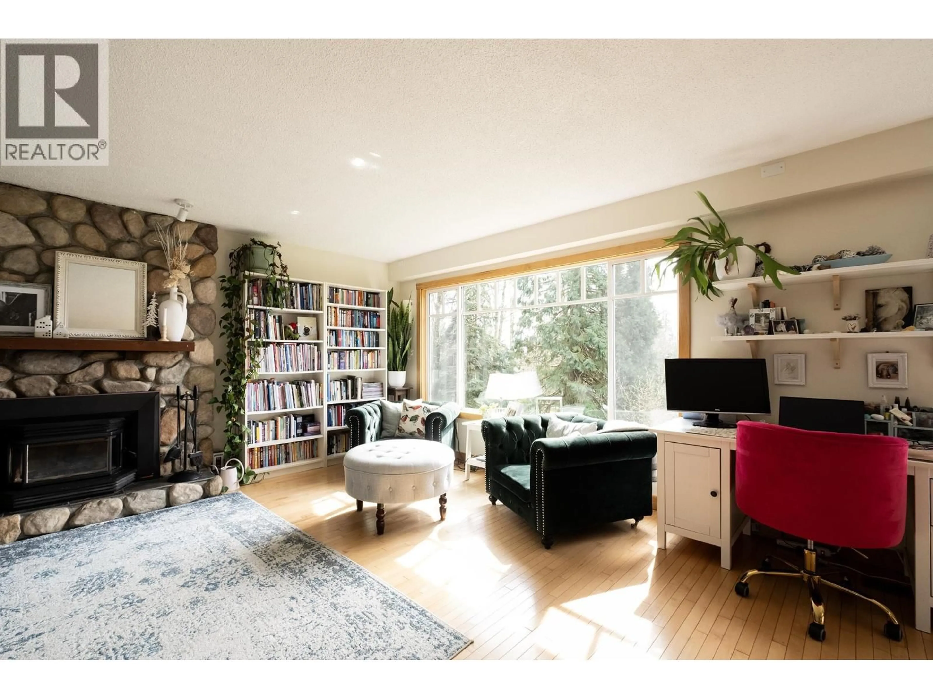 Living room with furniture, wood/laminate floor for 1930 RANCH ROAD, Roberts Creek British Columbia V0N2W5