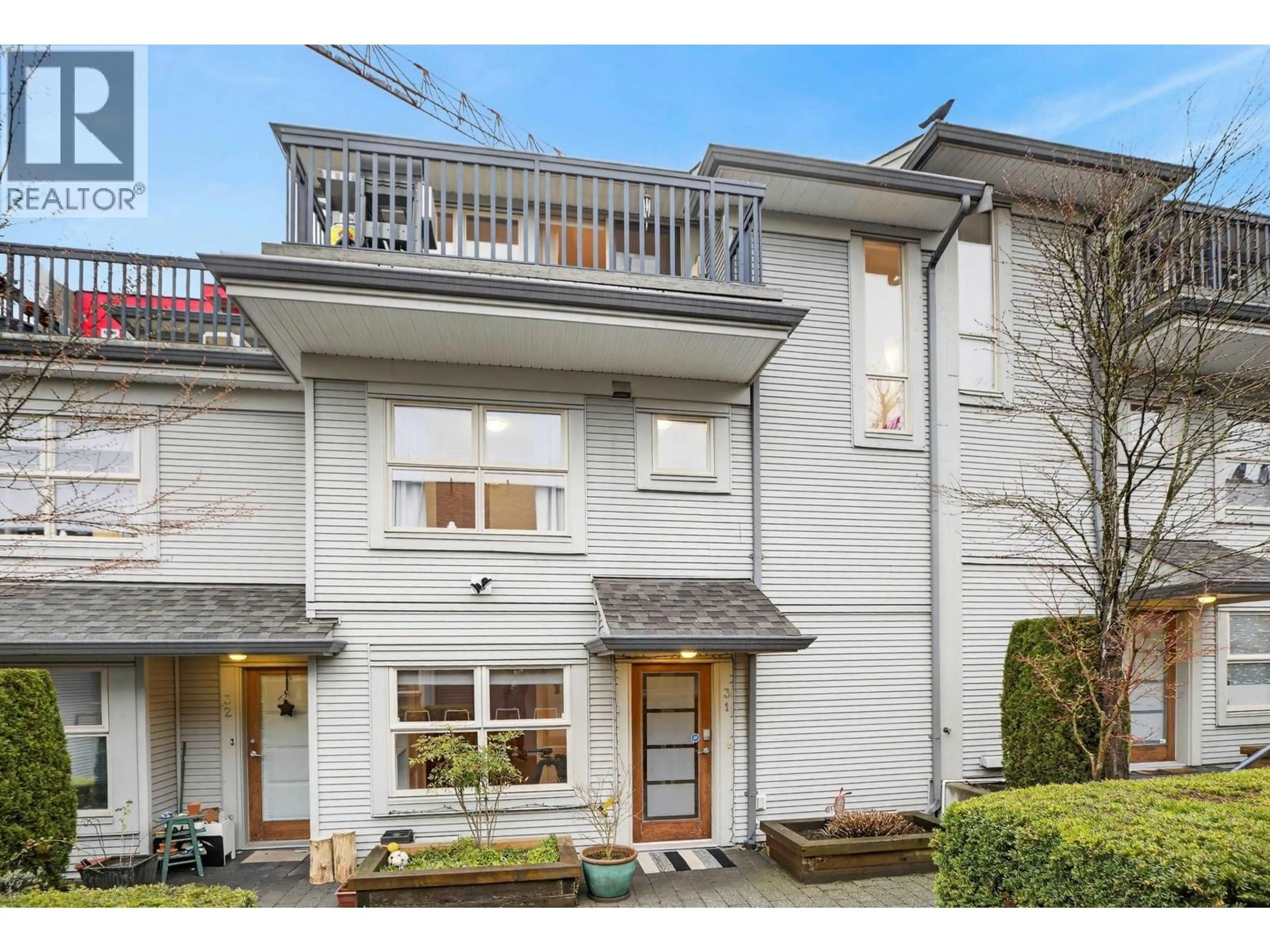 A pic from outside/outdoor area/front of a property/back of a property/a pic from drone, street for 31 - 3855 PENDER STREET, Burnaby British Columbia V5C1W5