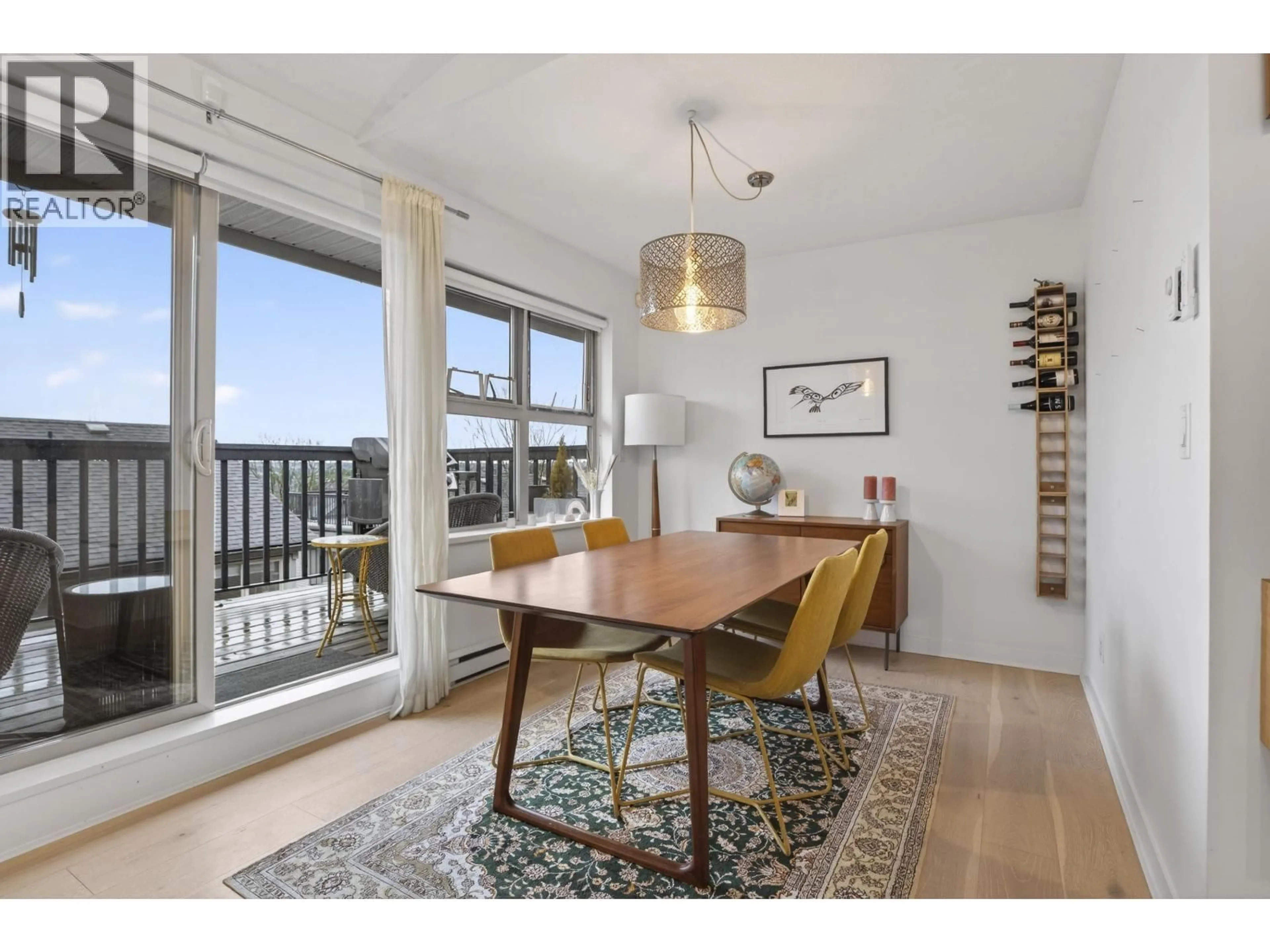 Dining room, wood/laminate floor for 31 - 3855 PENDER STREET, Burnaby British Columbia V5C1W5