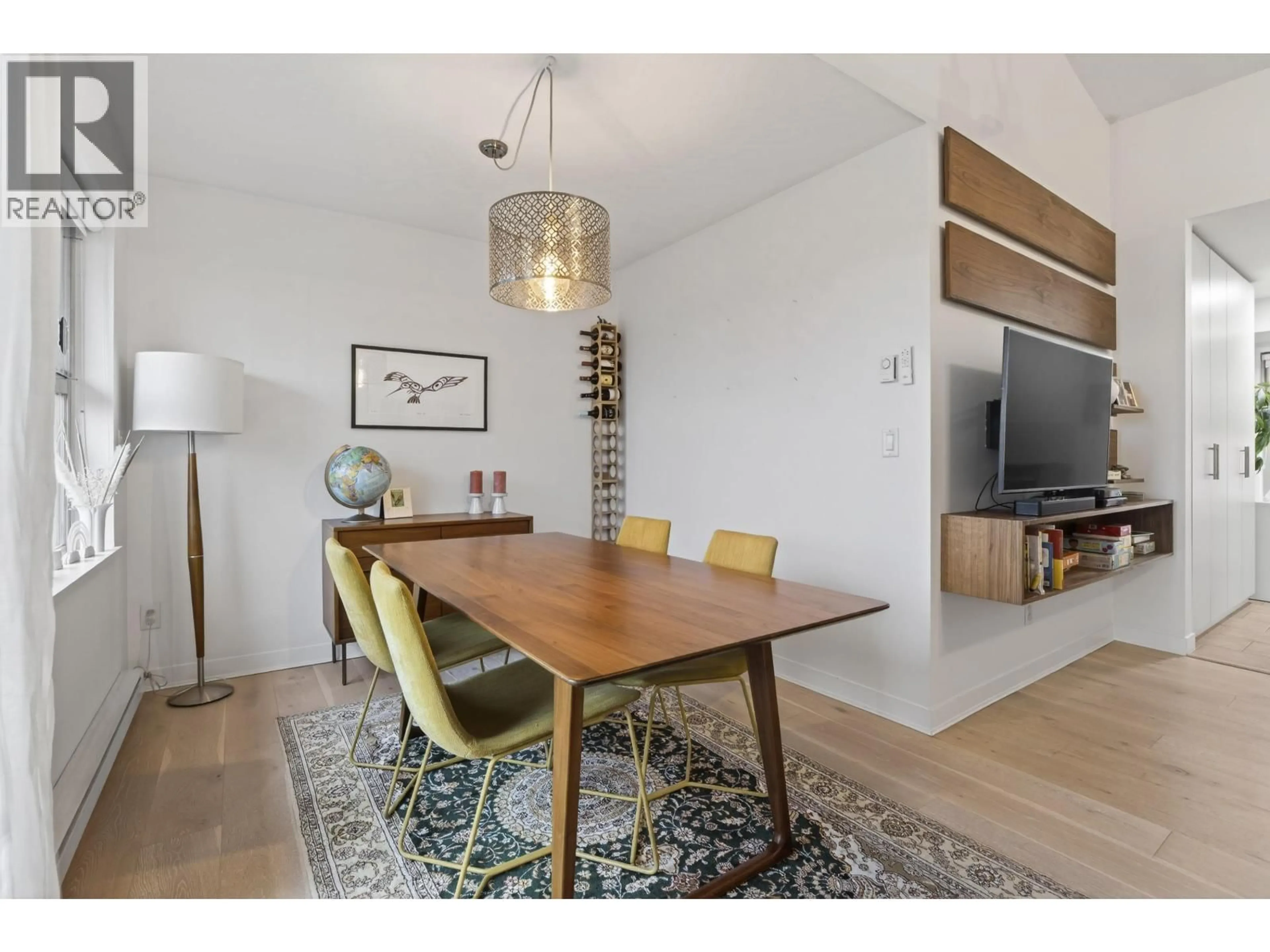 Dining room, wood/laminate floor for 31 - 3855 PENDER STREET, Burnaby British Columbia V5C1W5