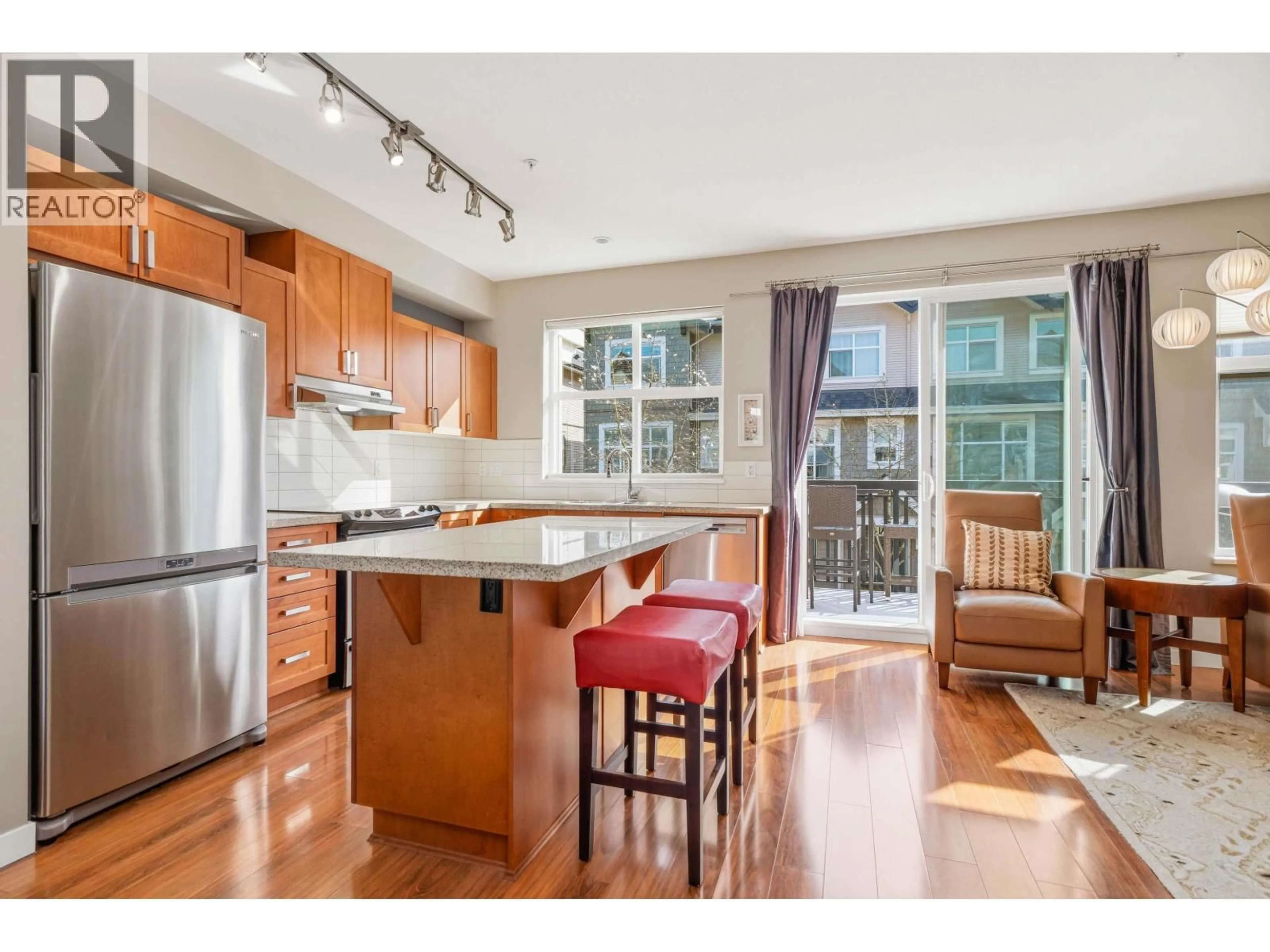 Open concept kitchen, wood/laminate floor for 716 ORWELL STREET, North Vancouver British Columbia V7J0A5