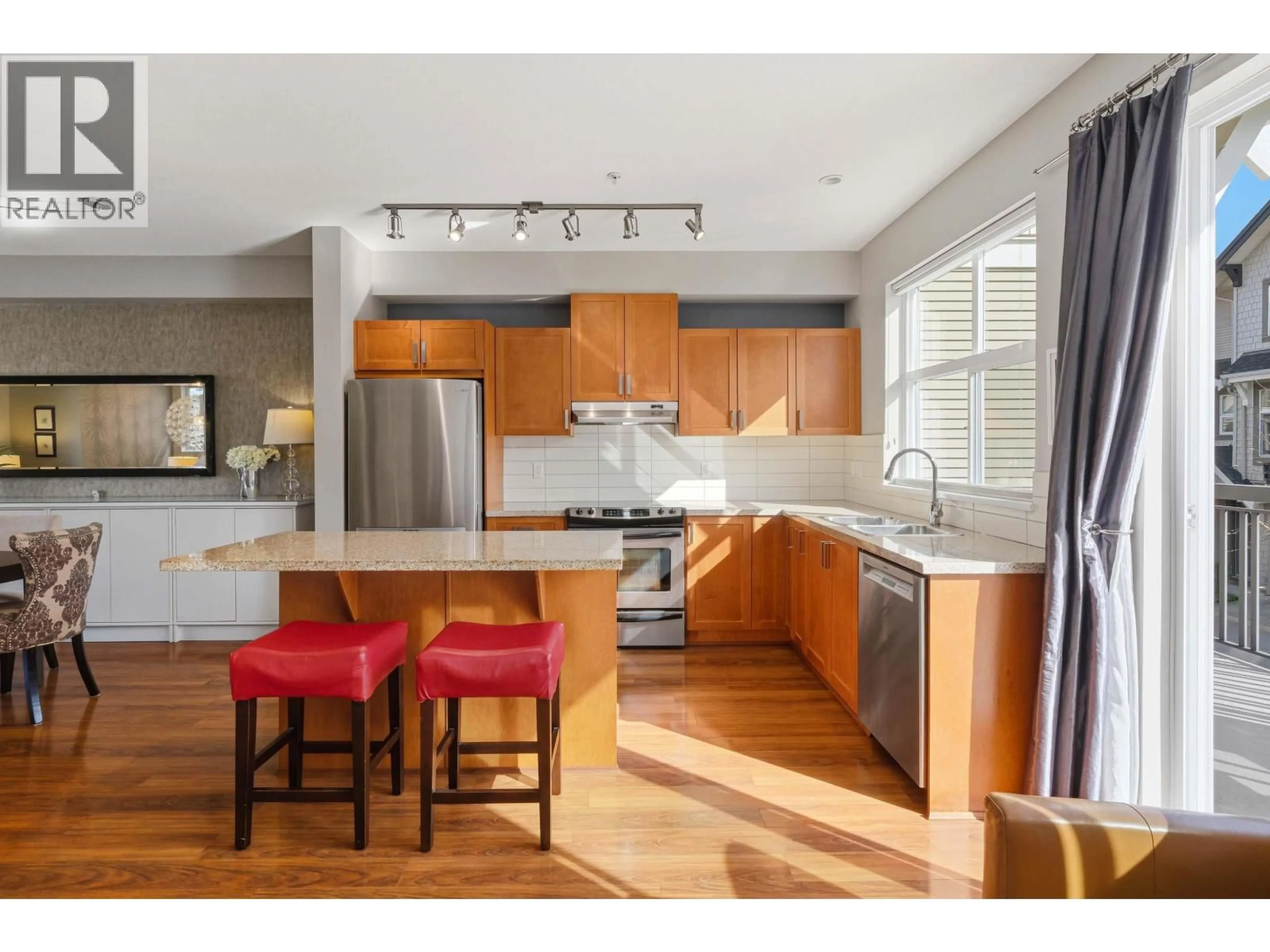 Open concept kitchen, wood/laminate floor for 716 ORWELL STREET, North Vancouver British Columbia V7J0A5