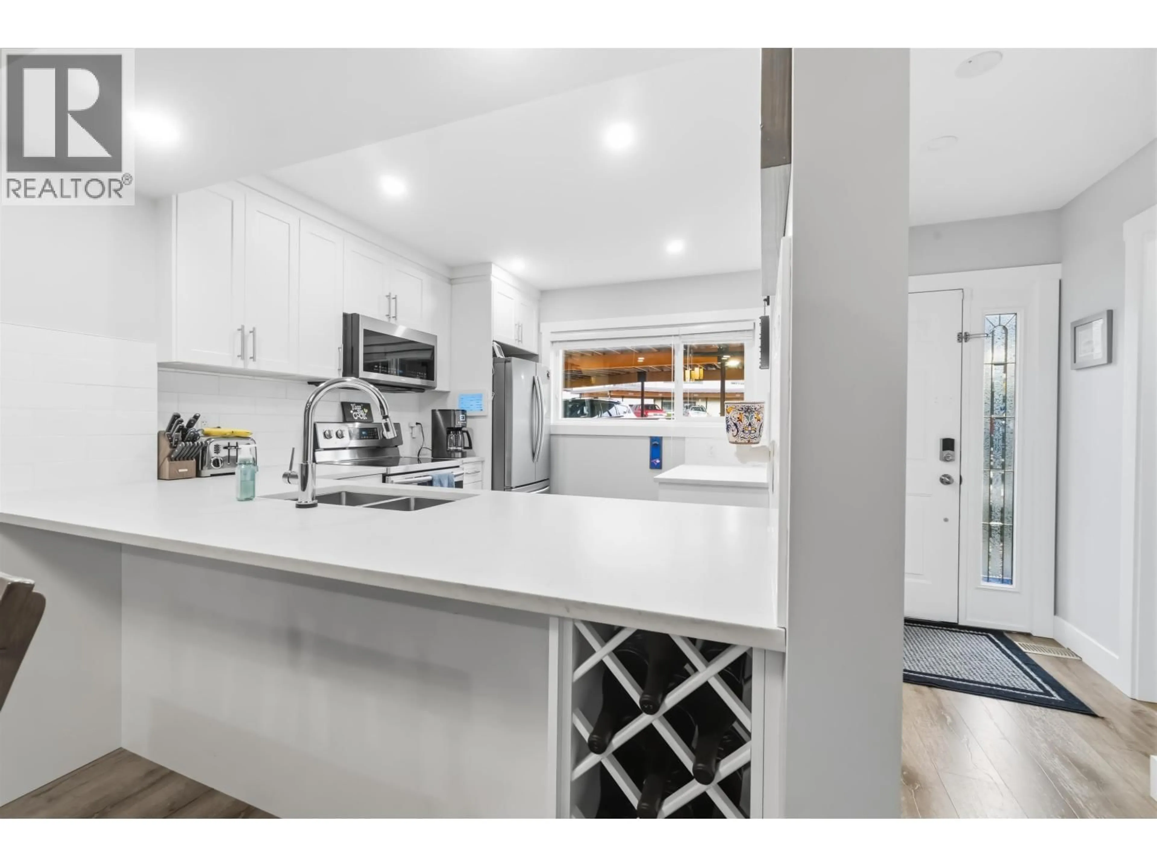 Open concept kitchen, ceramic/tile floor for 9016 ALTAIR PLACE, Burnaby British Columbia V3J1A7