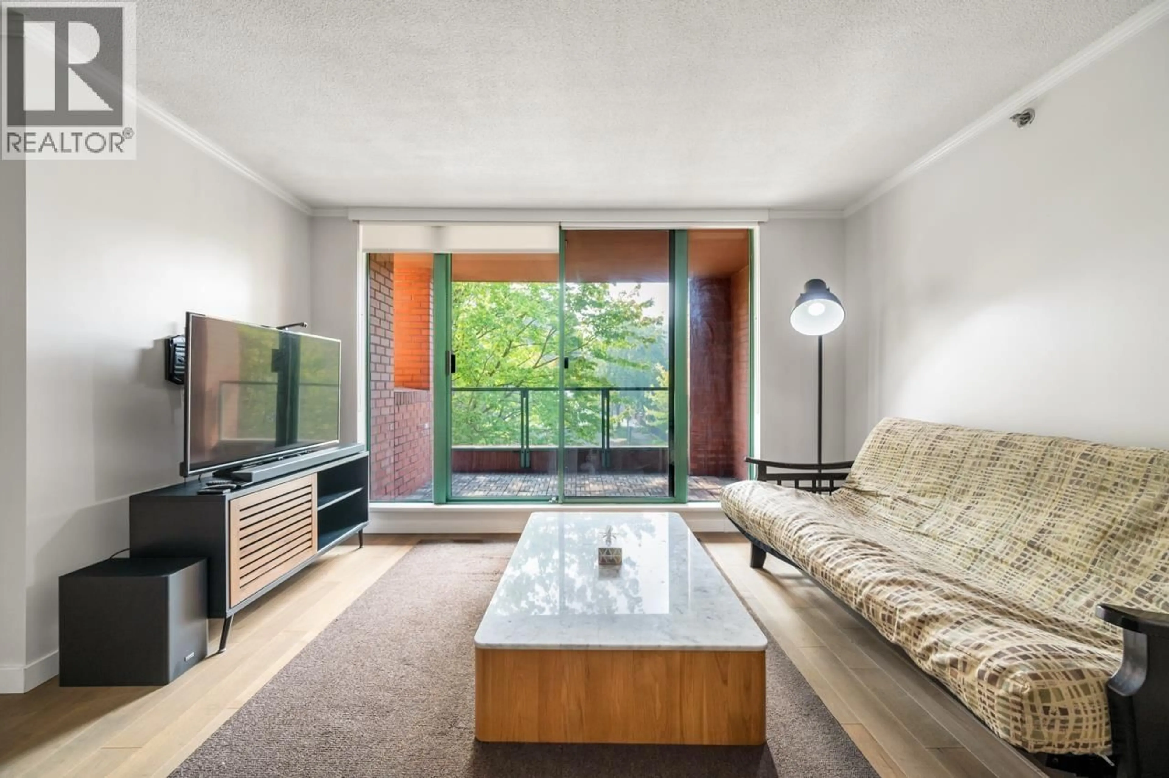 Living room with furniture, wood/laminate floor for 312 - 503 16TH AVENUE, Vancouver British Columbia V5C4N3