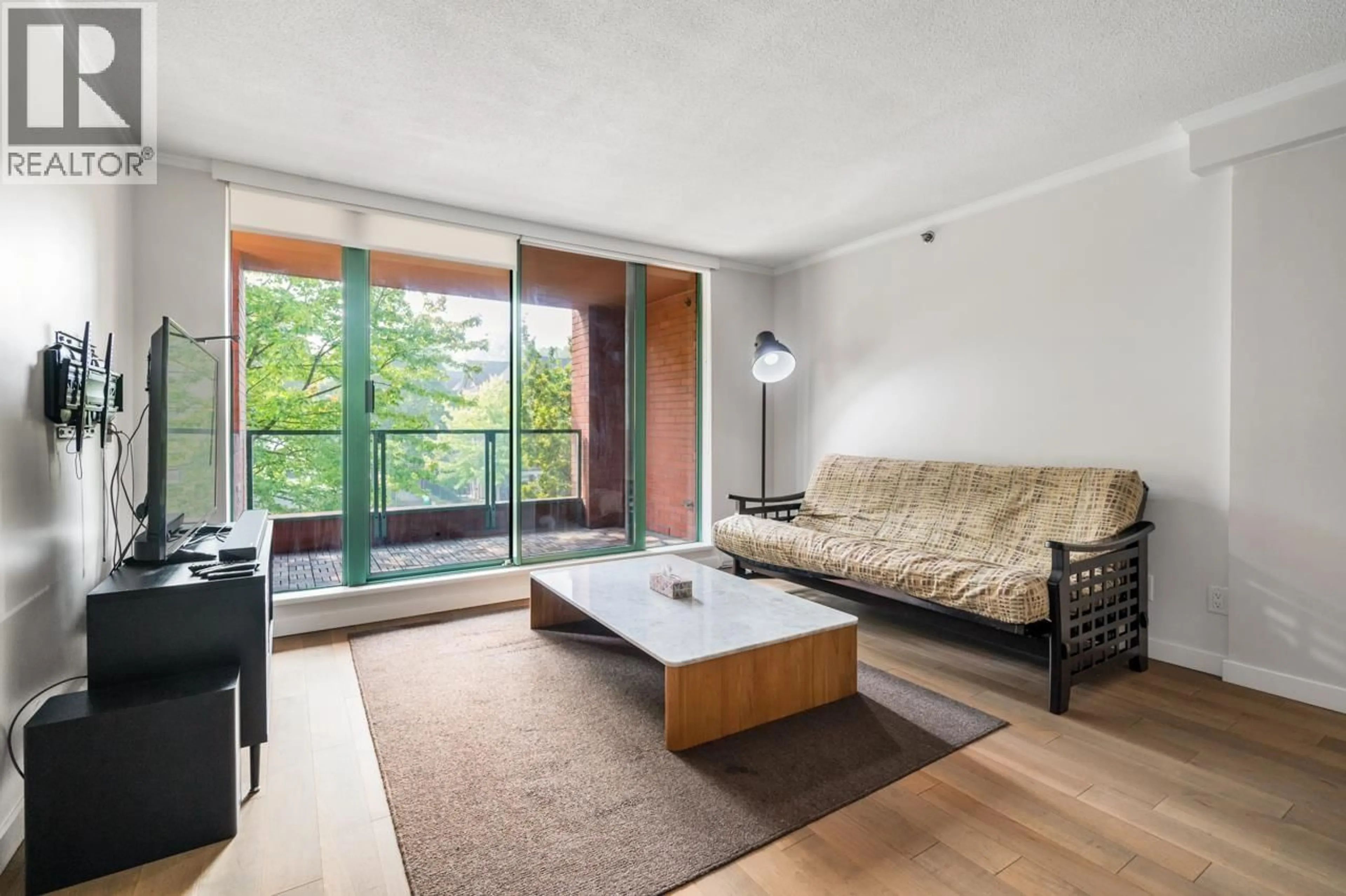 Living room with furniture, wood/laminate floor for 312 - 503 16TH AVENUE, Vancouver British Columbia V5C4N3