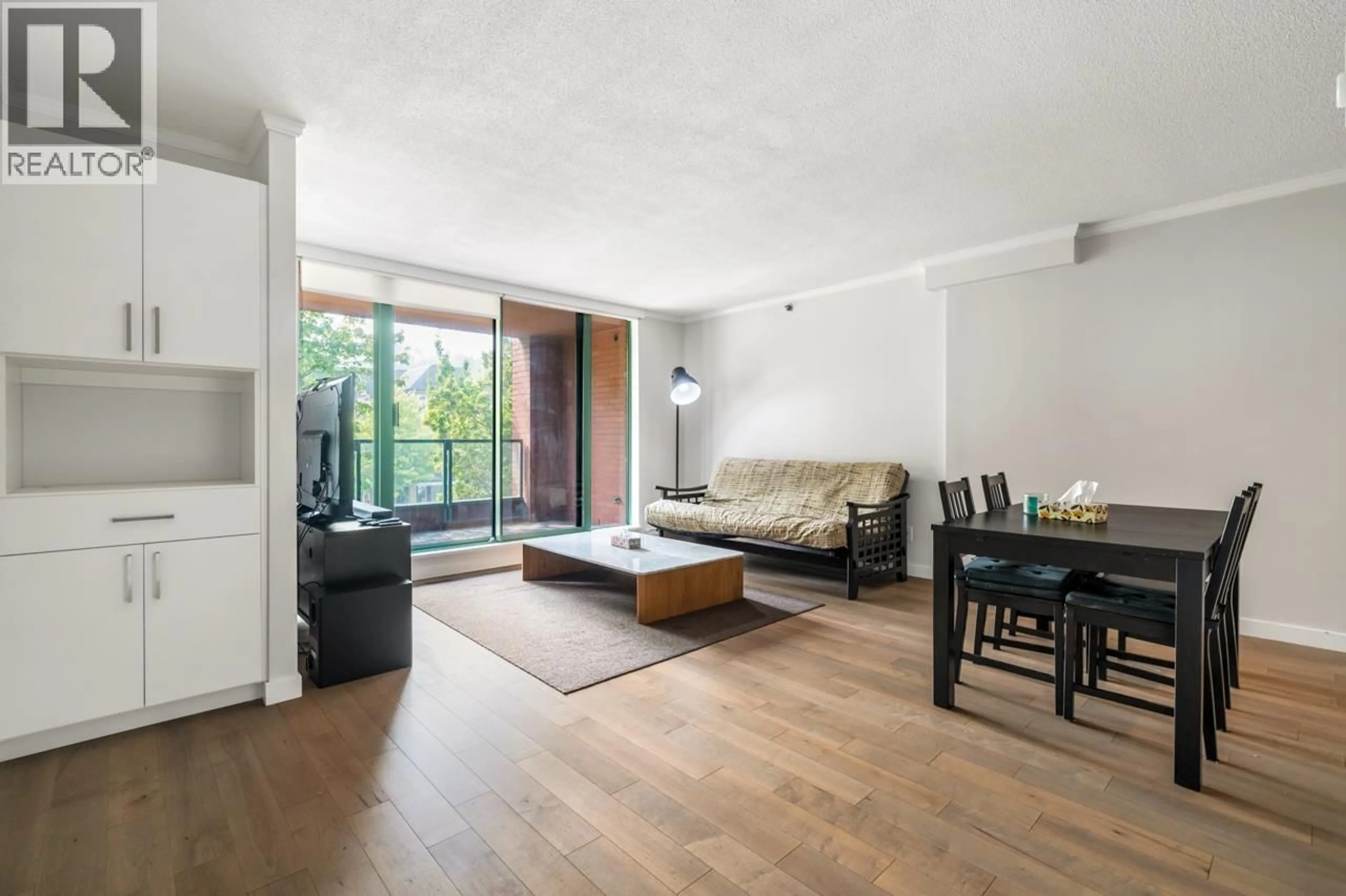 Living room with furniture, wood/laminate floor for 312 - 503 16TH AVENUE, Vancouver British Columbia V5C4N3