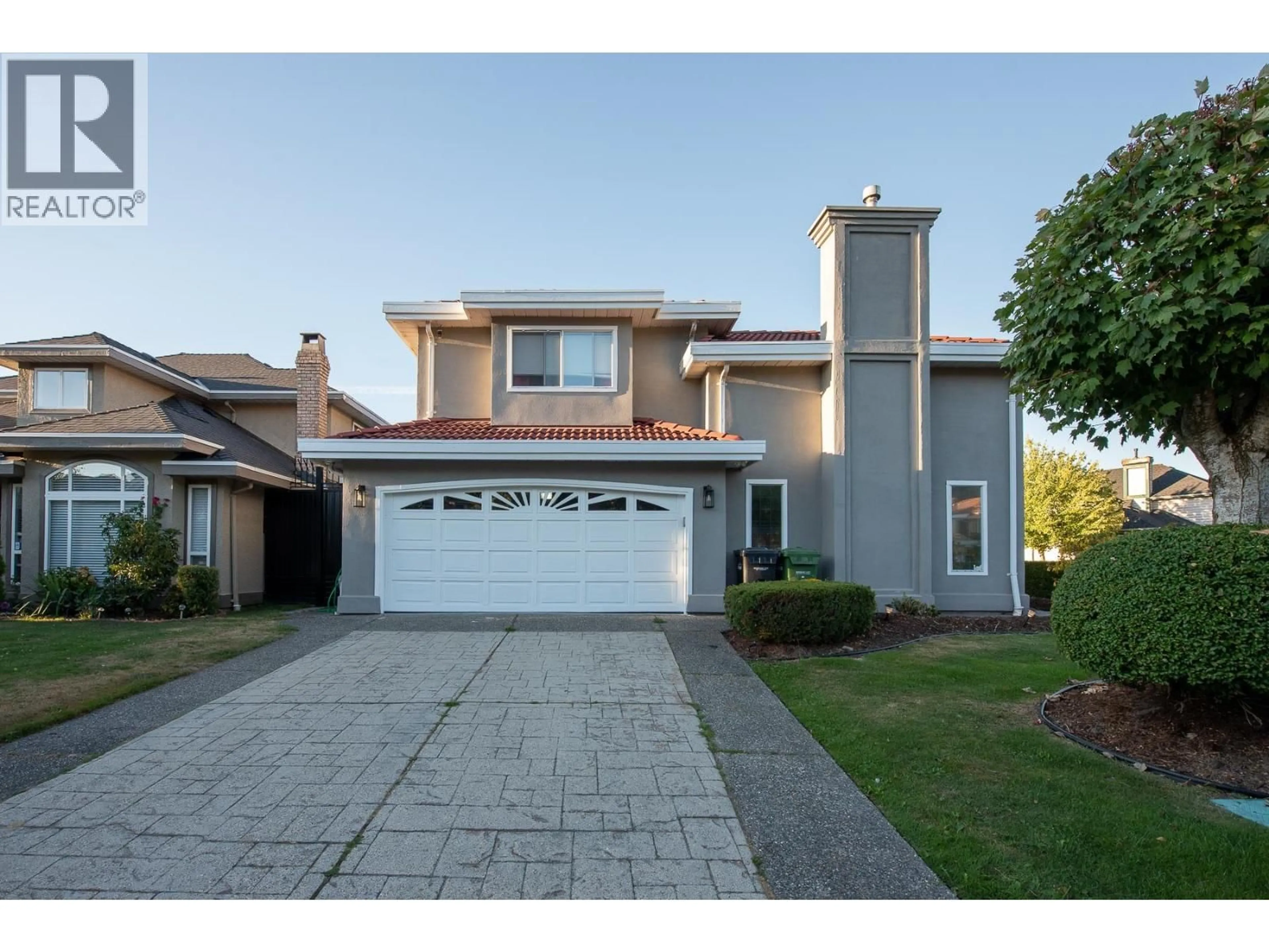 Home with vinyl exterior material, street for 12460 JENSEN DRIVE, Richmond British Columbia V6V2R7