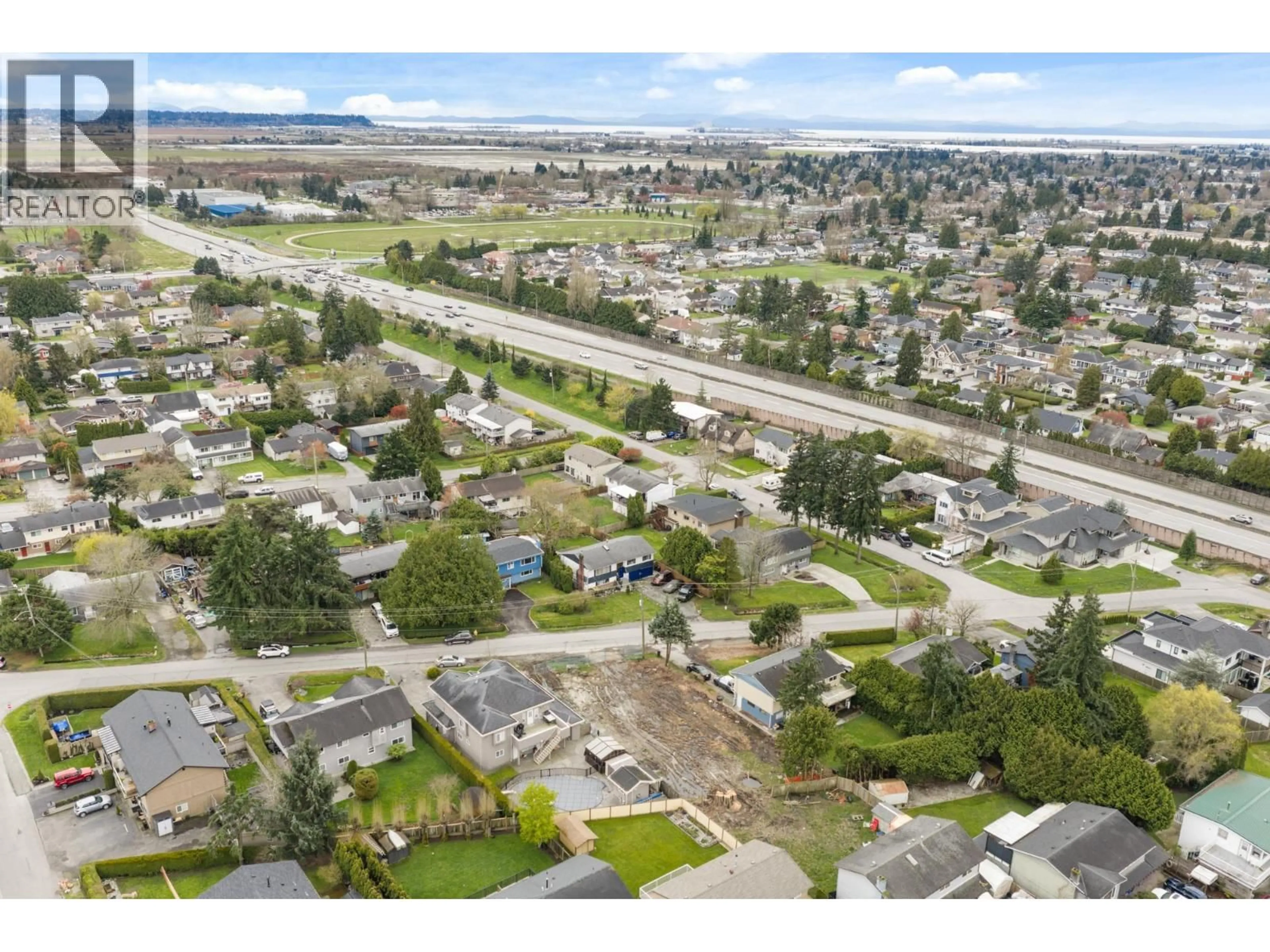 A pic from outside/outdoor area/front of a property/back of a property/a pic from drone, street for 6063 BRODIE ROAD, Delta British Columbia V4K2B6