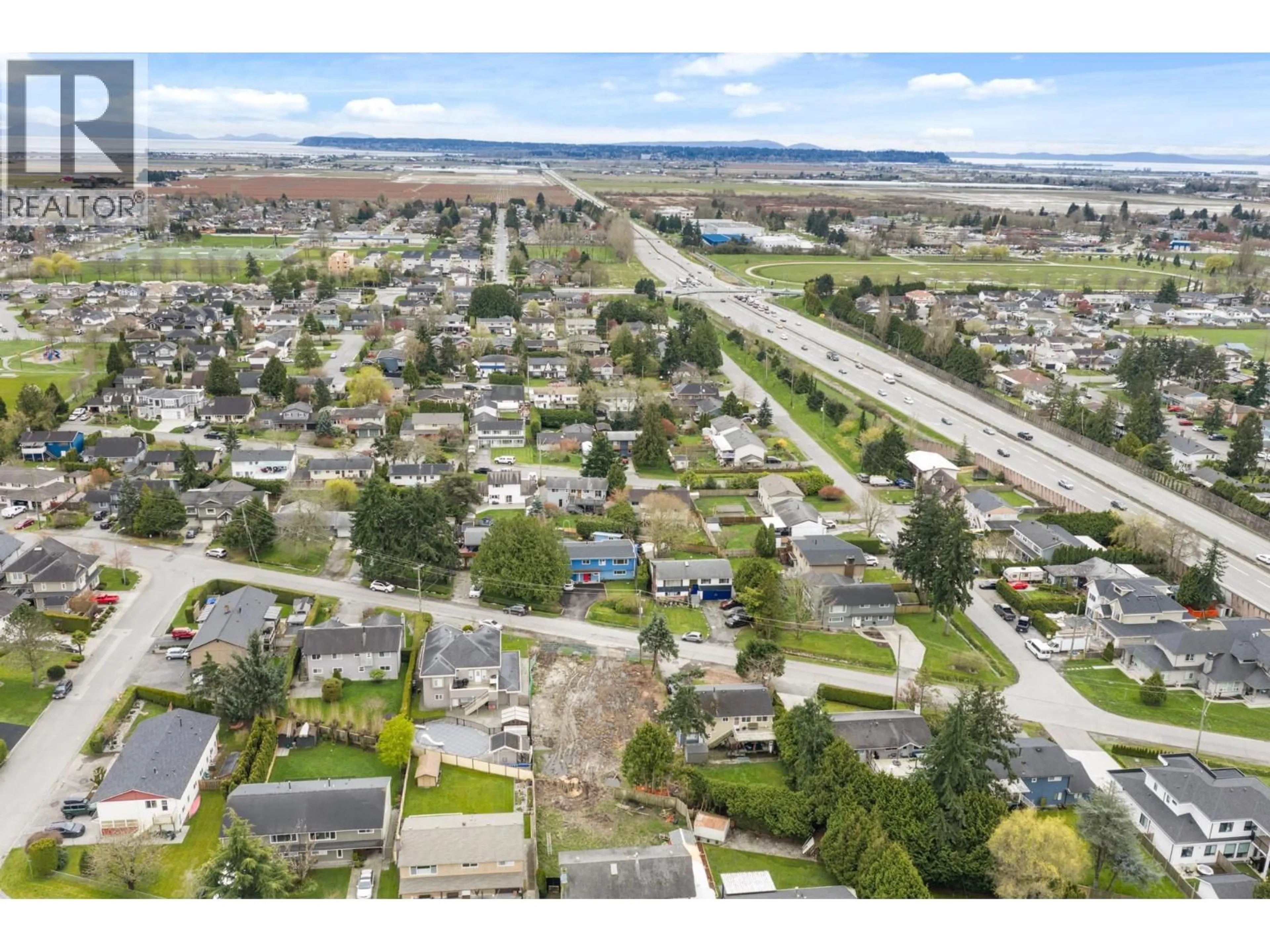 A pic from outside/outdoor area/front of a property/back of a property/a pic from drone, street for 6063 BRODIE ROAD, Delta British Columbia V4K2B6