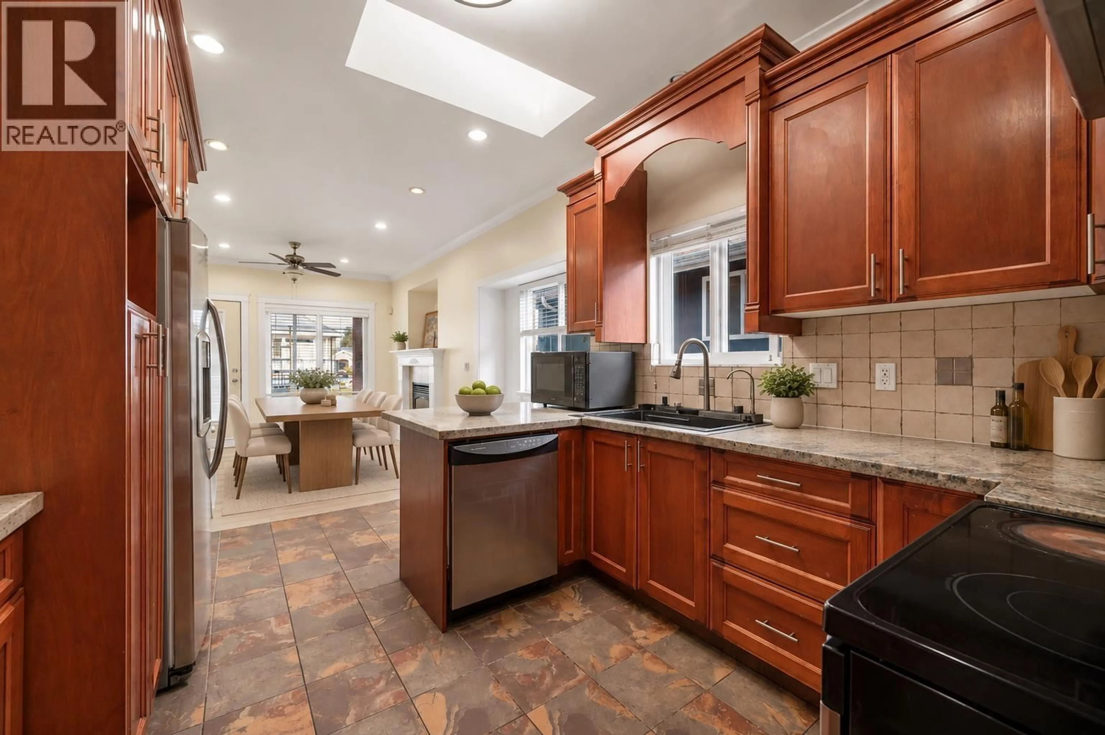 Open concept kitchen, ceramic/tile floor for 11215 WILLIAMS ROAD, Richmond British Columbia V7A1J2