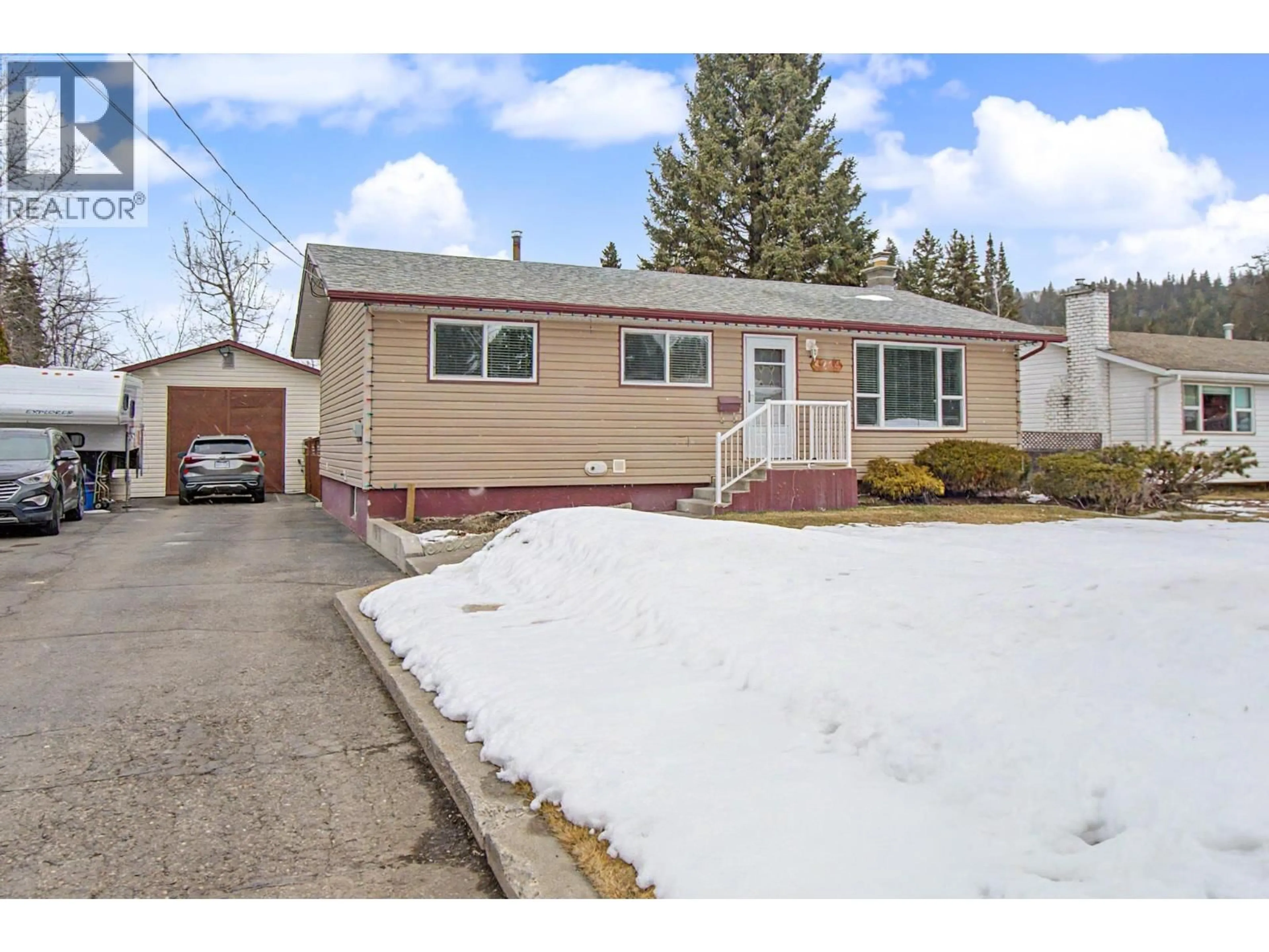 Home with vinyl exterior material, street for 4244 CRAIG DRIVE, Prince George British Columbia V2K1E5